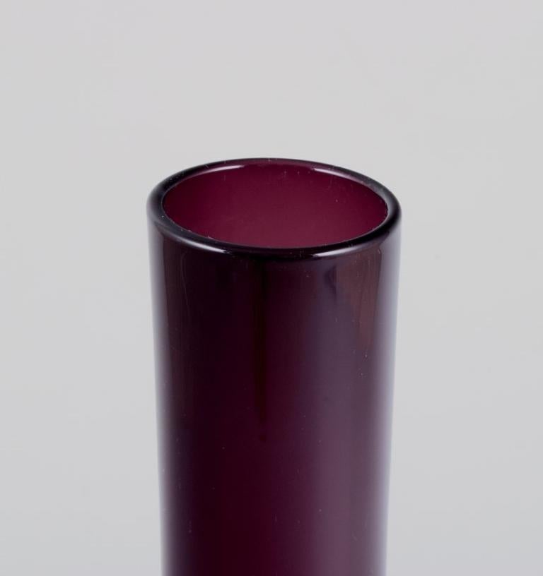 Late 20th Century Swedish designer, two vases in violet and clear mouth-blown glass. For Sale