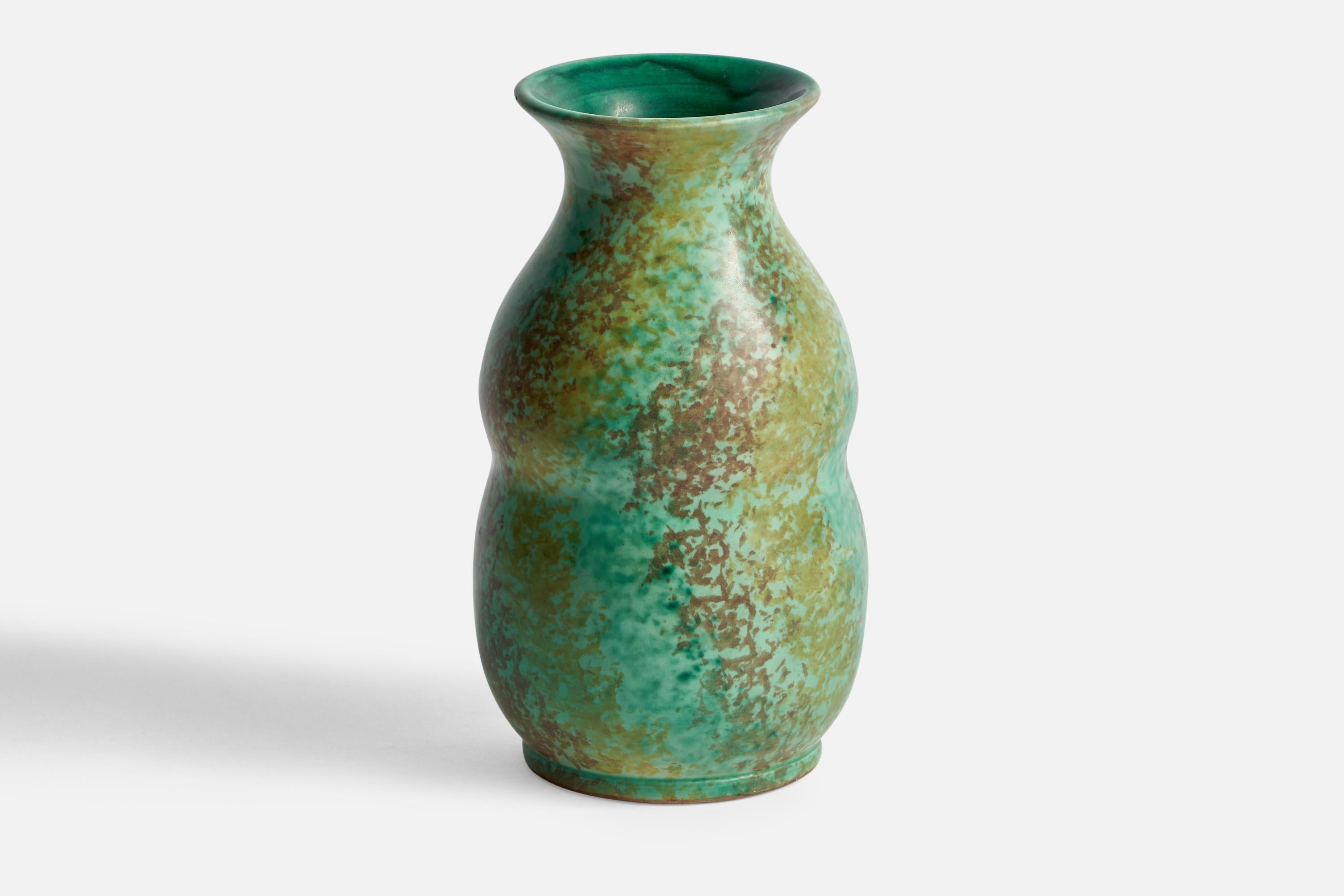 A green and brown-glazed ceramic vase designed and produced in Sweden, c. 1920s.