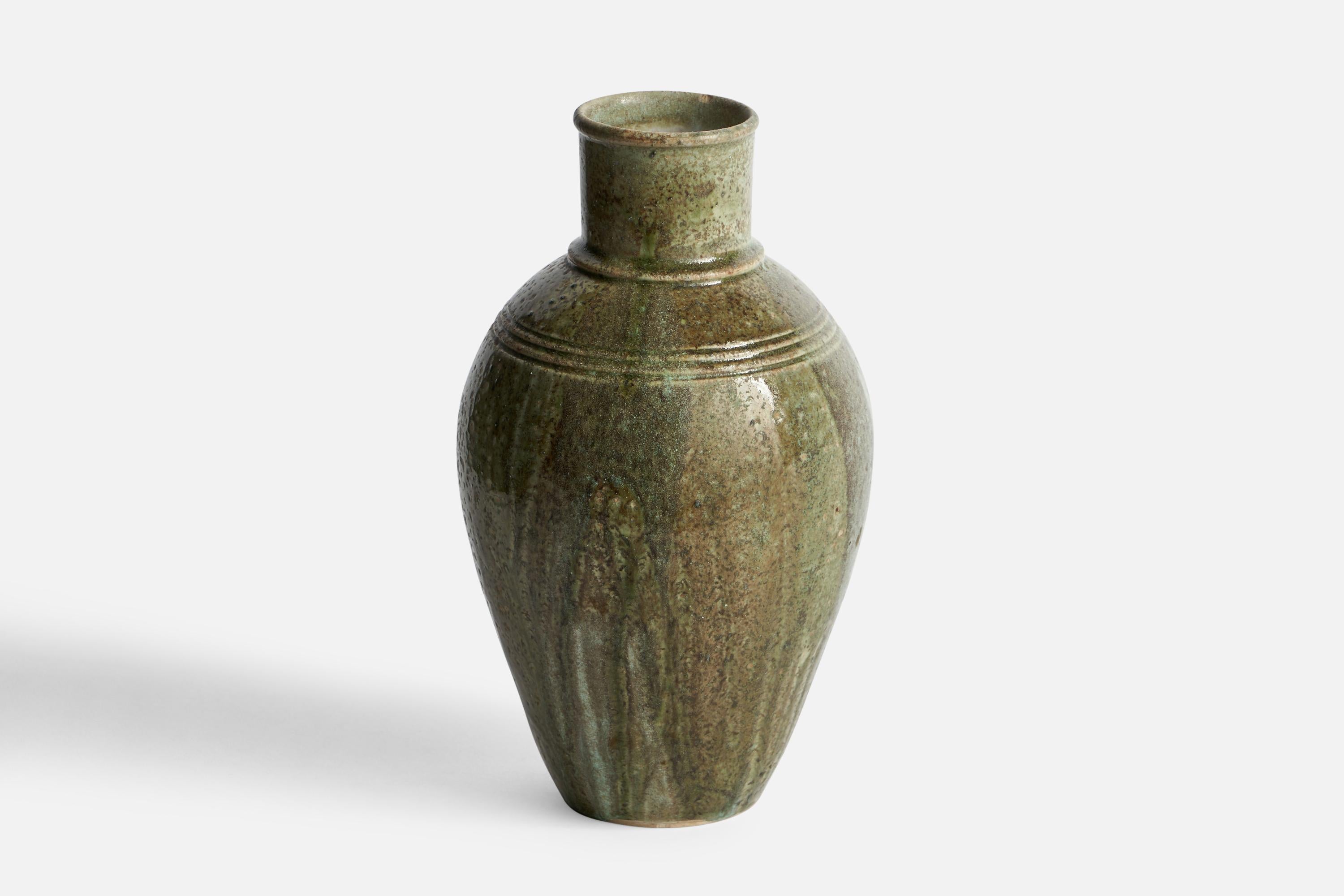A green-glazed ceramic vase designed and produced in Sweden, c. 1940s.