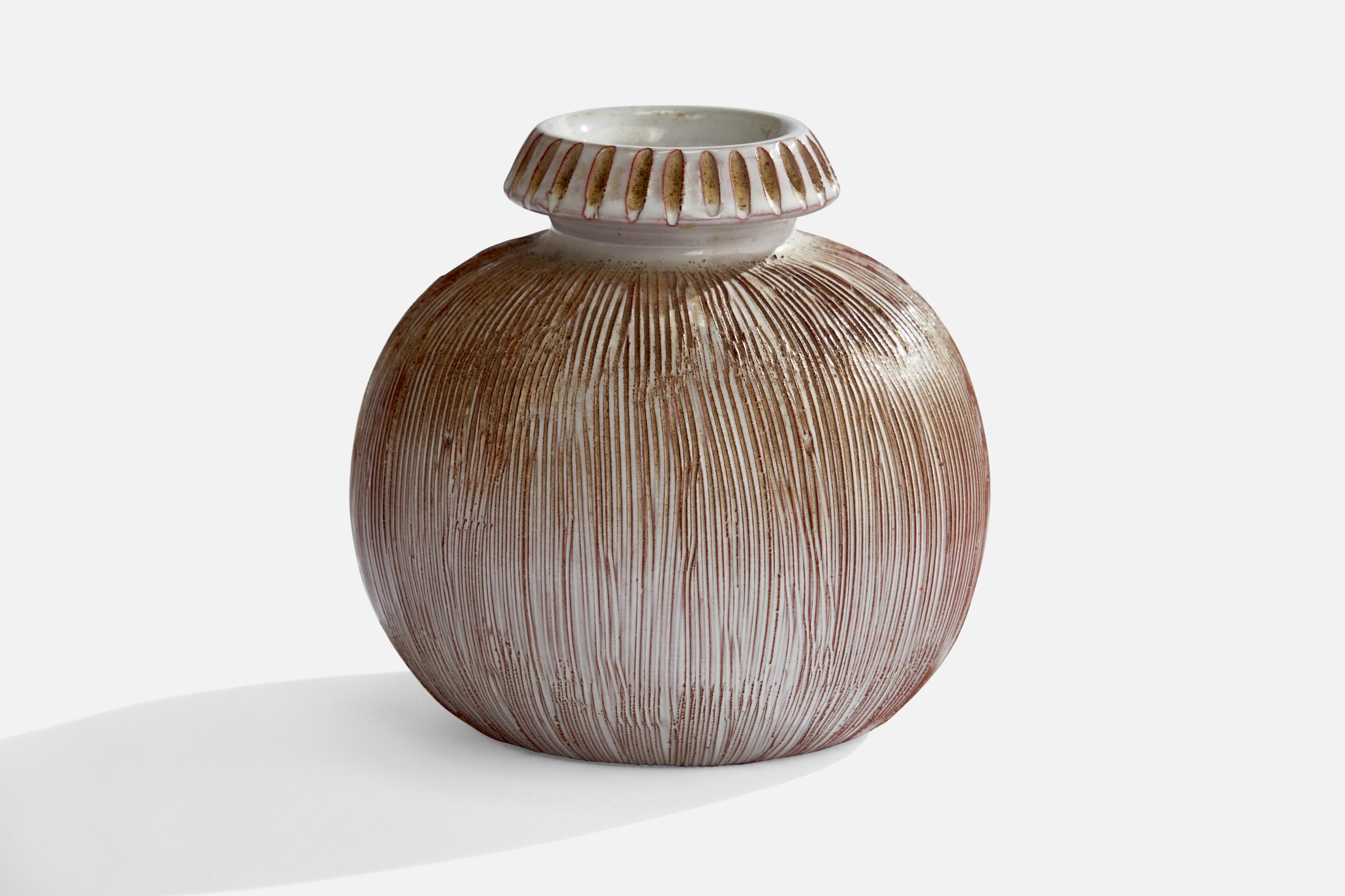 A white and brown-glazed incised vase designed and produced in Sweden, c. 1960s.