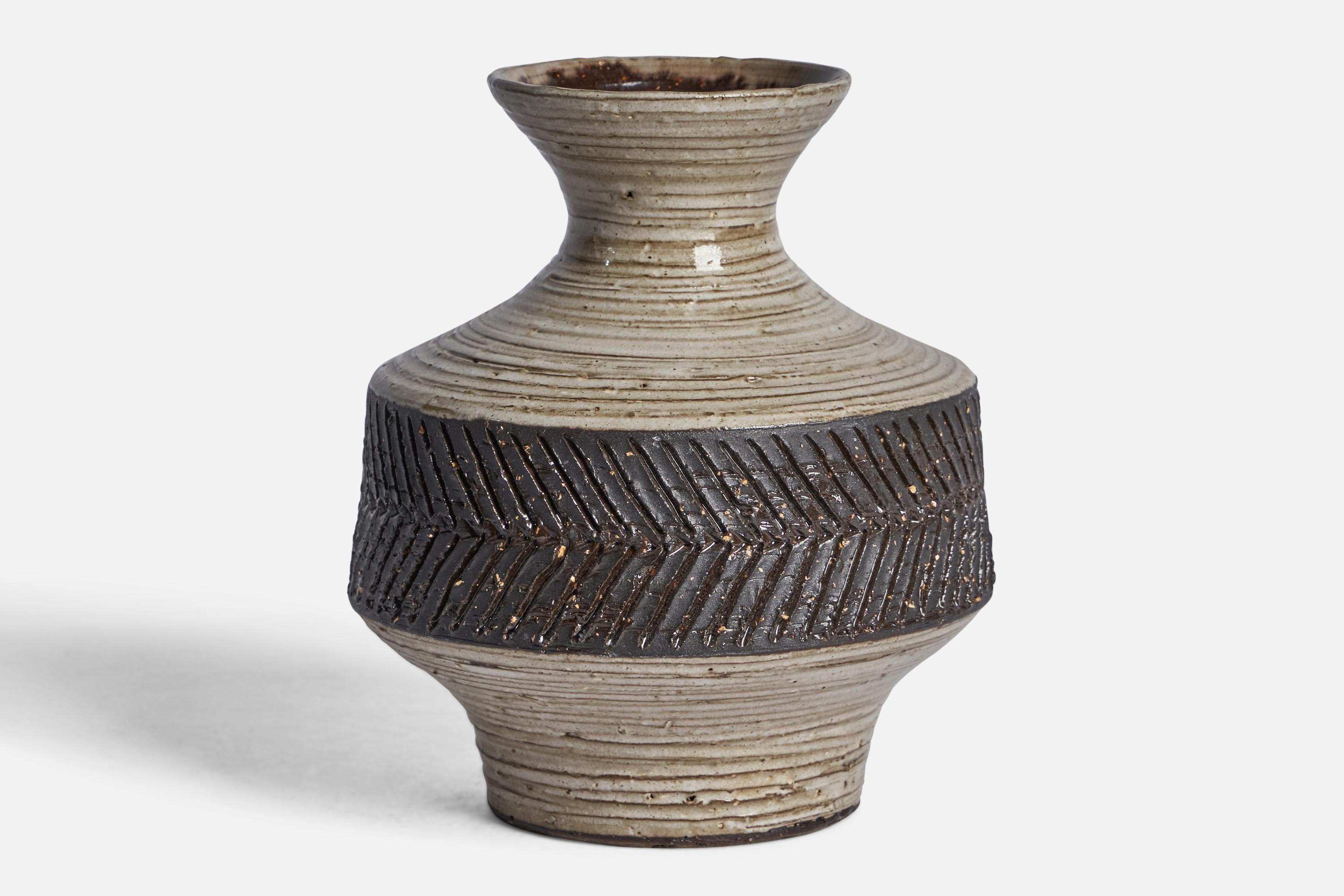 A grey and black-glazed ceramic vase designed and produced in Sweden, 1966.