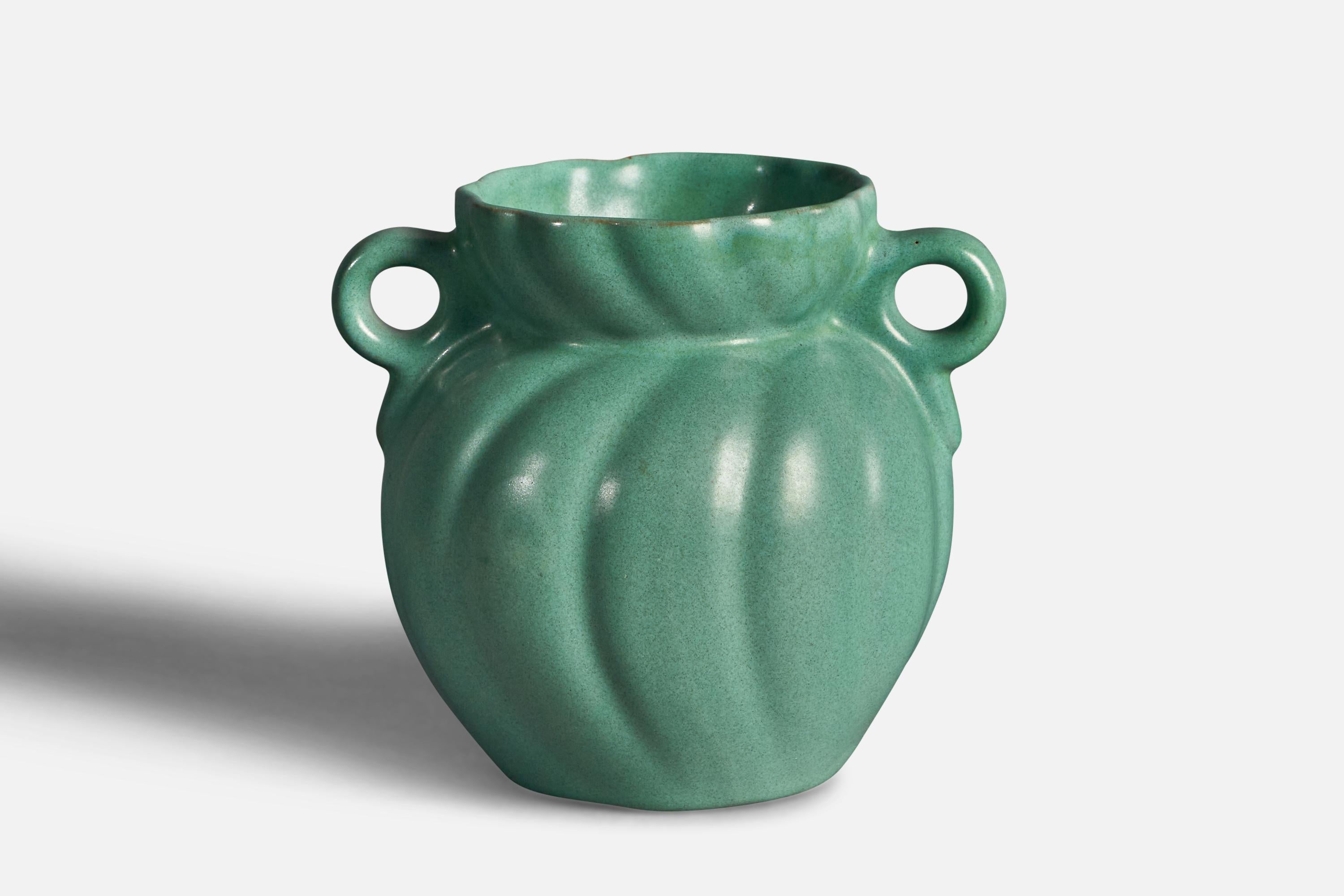 A green-glazed earthenware vase designed and produced in Sweden, c. 1920s.