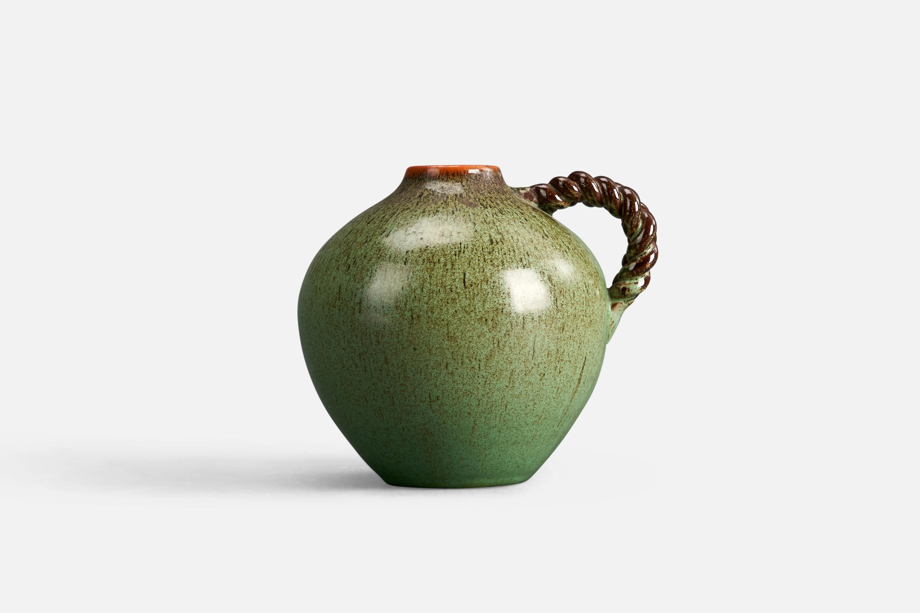 A green-glazed earthenware vase designed and produced by a Swedish designer, Sweden, 1940s.