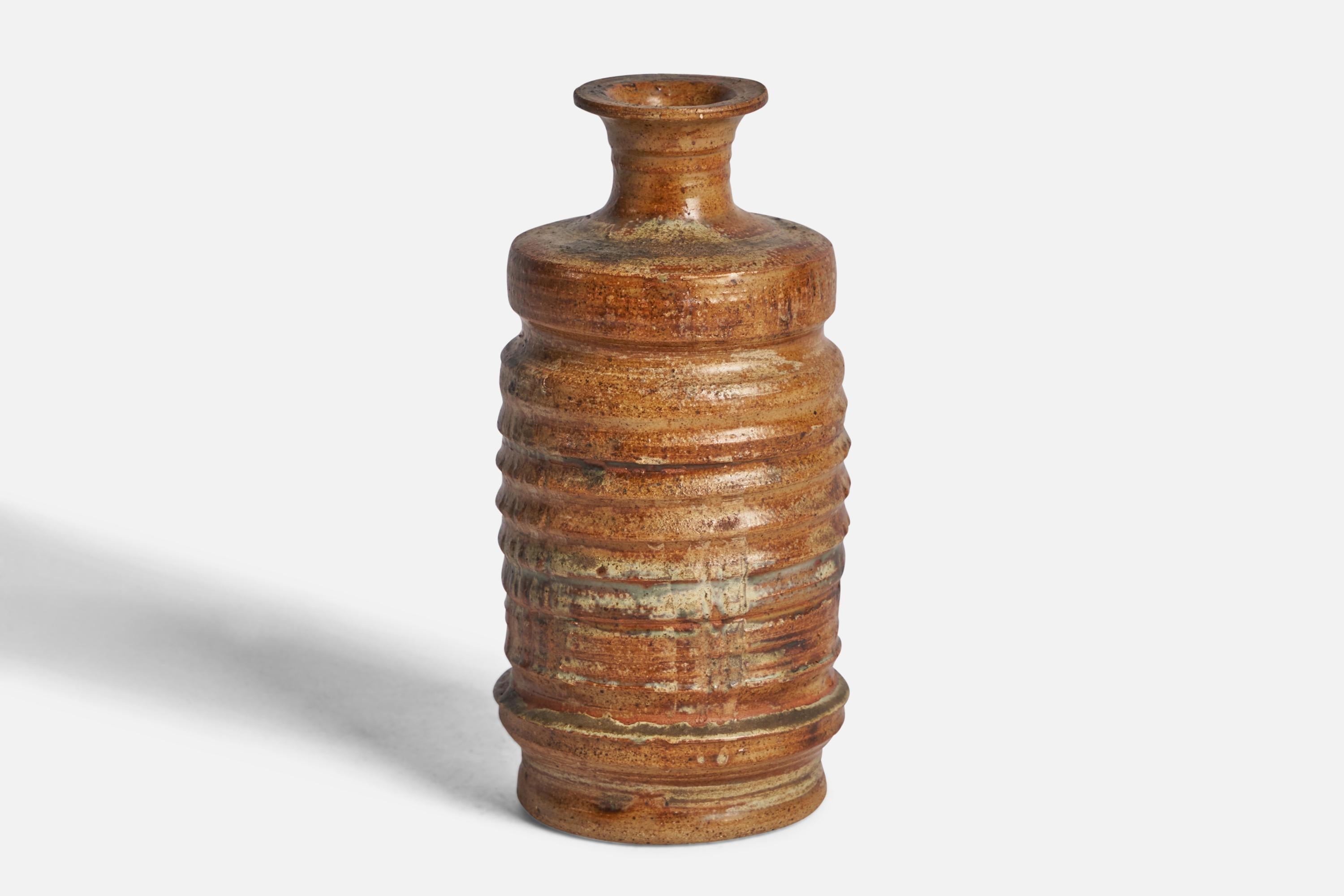 A brown-glazed stoneware vase designed and produced in Sweden, c. 1960s.