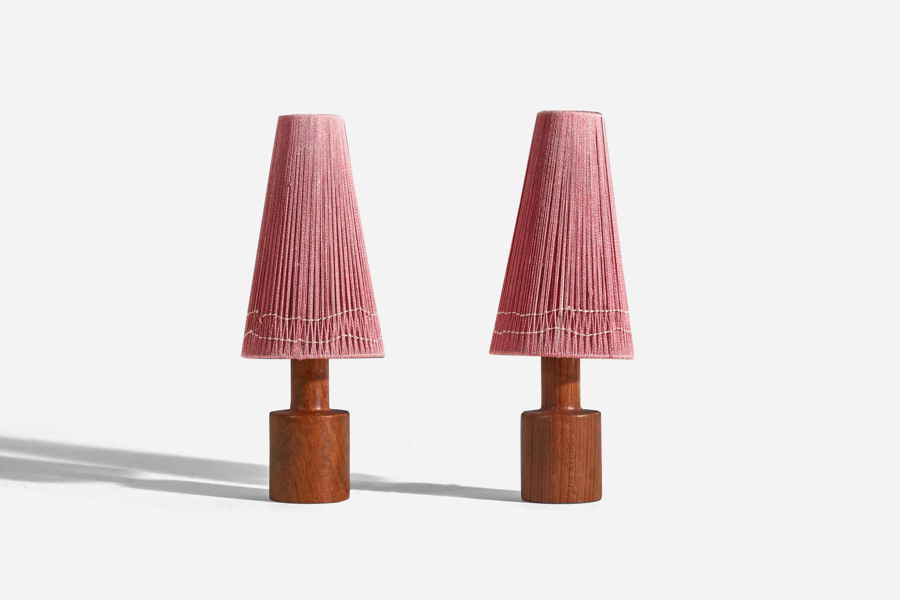 A pair of very small teak and string table lamps designed and produced in Sweden, 1950s. 

Sold with lampshade. 
Dimensions of Lamp (inches) : 6.18 x 2.17 x 2.17 (height x width x depth)
Dimensions of Shade (inches) : 1.75 x 3.82 x 6.5 (top