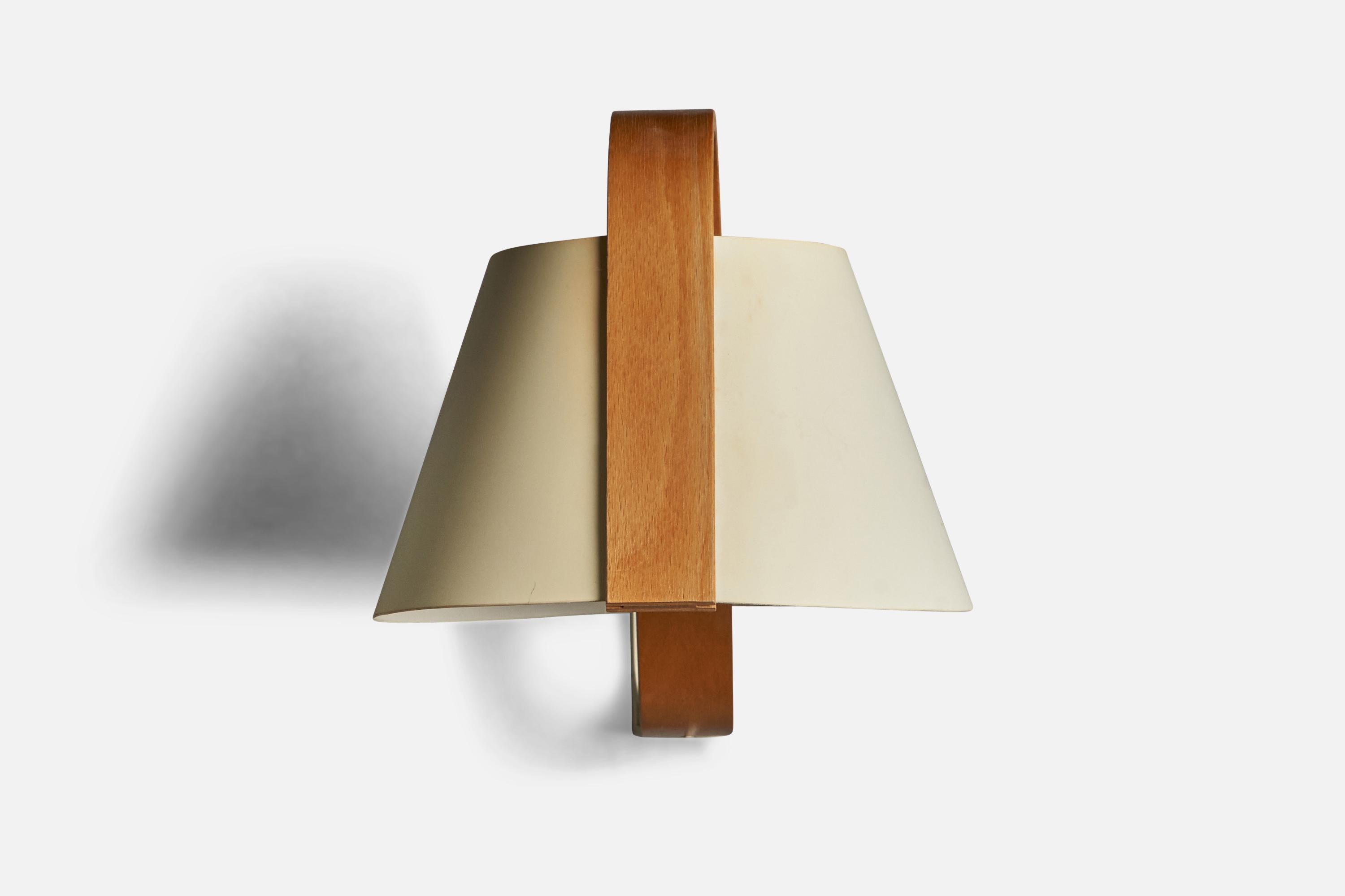 An adjustable bentwood, paper and plastic wall light designed and produced in Sweden, c. 1980s.

Please note lamp functions via plug in, cord feeding from stem close to backplate.

Overall Dimensions (inches): 10.75” H x 9.15” W x 14.5” D

Back