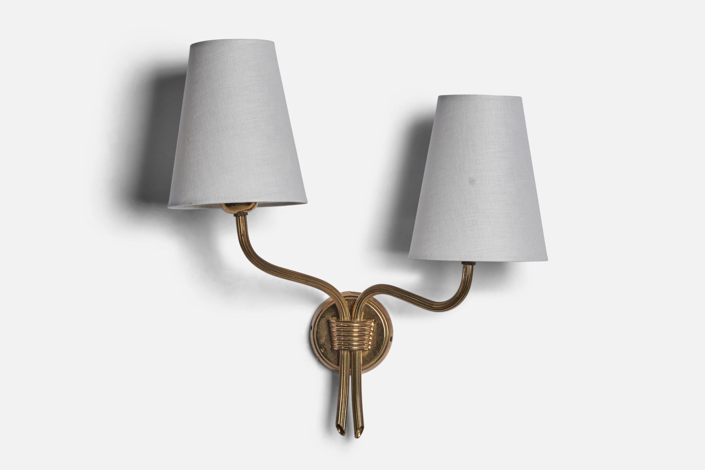 
A two-armed brass and white fabric wall light designed and produced in Sweden, 1940s.
Overall Dimensions (inches): 15.25” H x 13.5” W x 6.25” D
Back Plate Dimensions (inches): 3.1” Diameter
Bulb Specifications: E-26 Bulb
Number of Sockets: 2
All