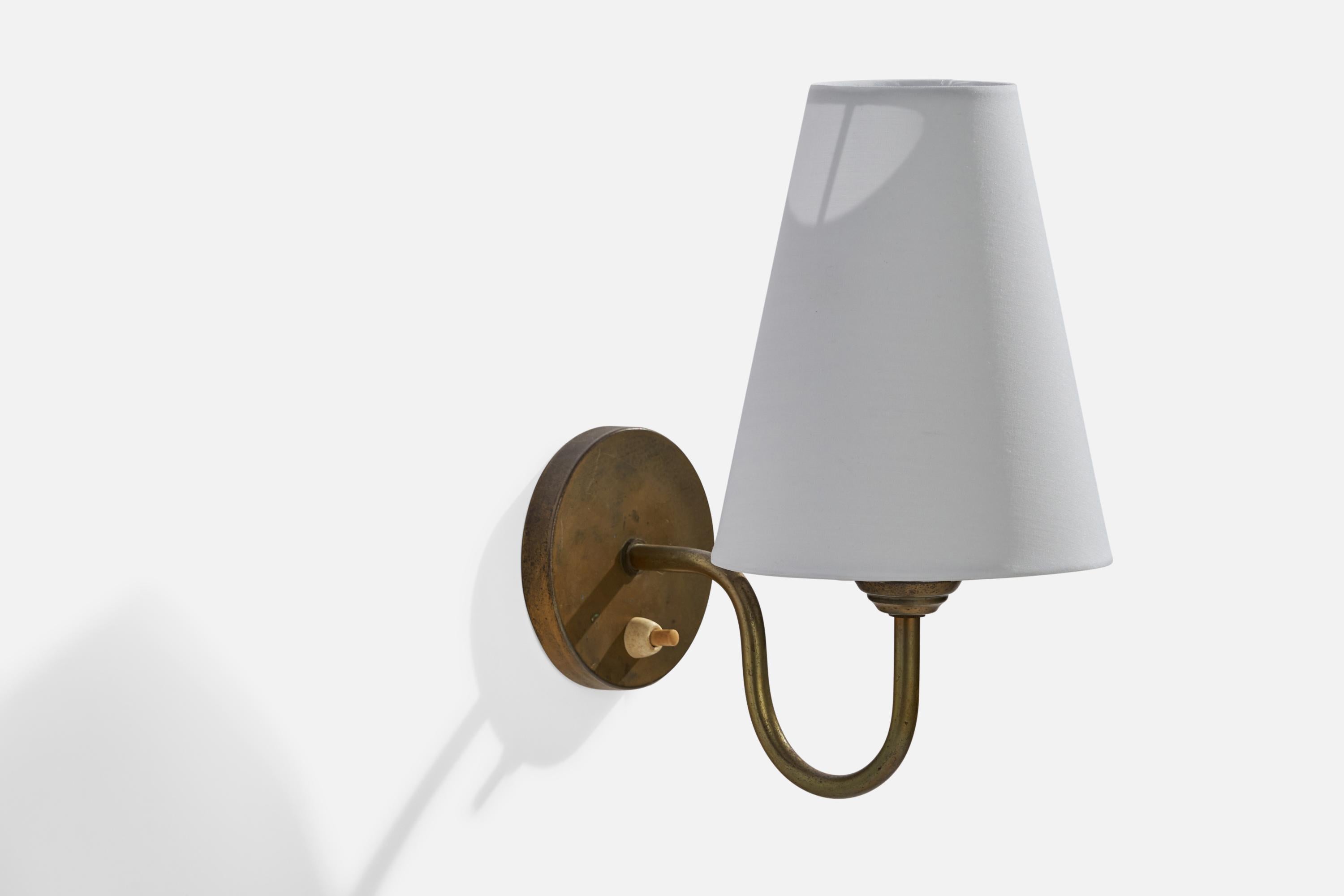 A brass and white fabric wall light designed and produced in Sweden, 1940s.

Overall Dimensions (inches): 10.5” H x 5.5” W x 8.25” D
Back Plate Dimensions (inches): 3.75”  H x 3.75” W x .50”  D
Bulb Specifications: E-26 Bulb
Number of Sockets: 1
All
