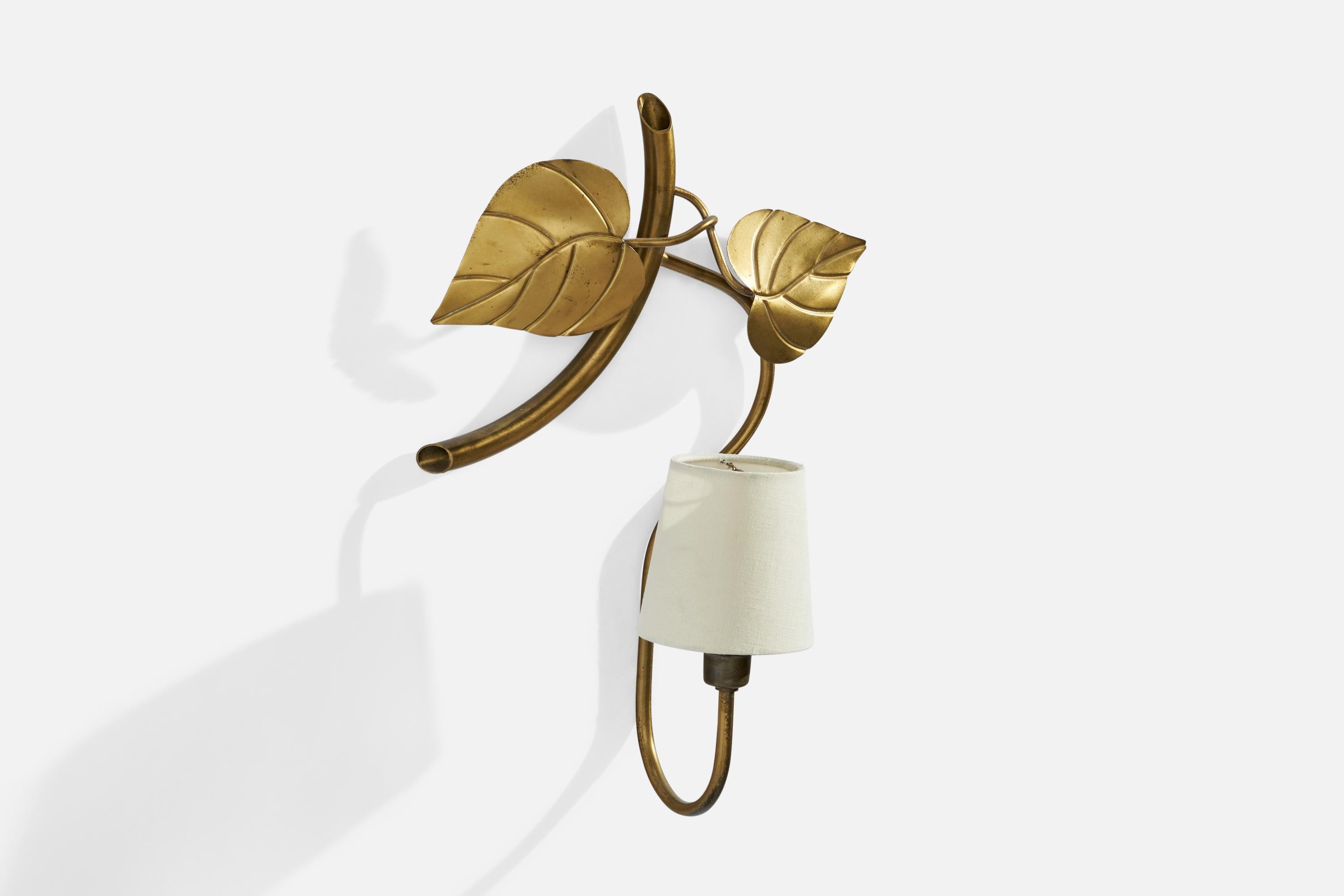 A brass and off-white fabric wall light designed and produced in Sweden, 1940s.

Overall Dimensions (inches): 17” H x 11.5”  W x 6” D
Back Plate Dimensions (inches): N/A
Bulb Specifications: E-12 Bulb
Number of Sockets: 1
All lighting will be
