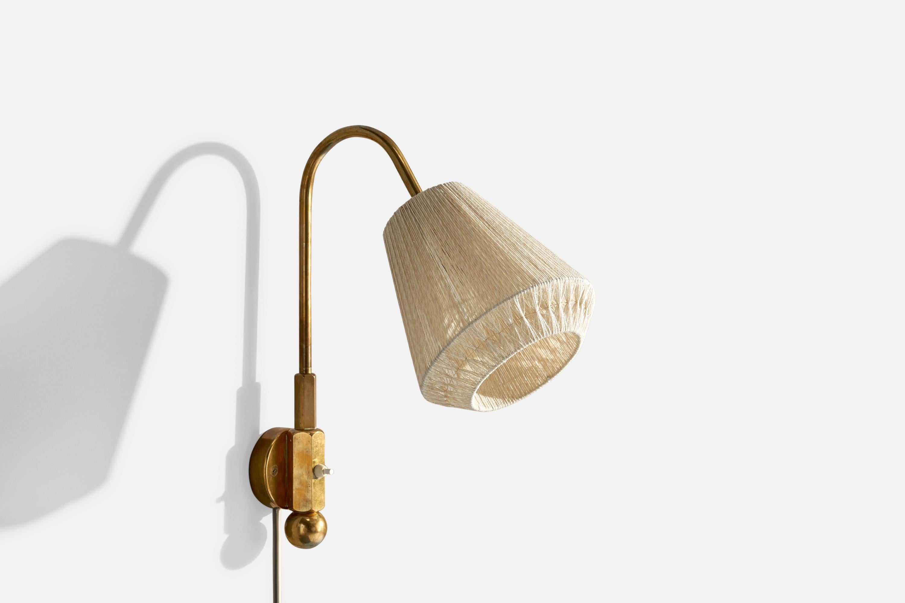 A brass and off white string fabric wall light designed and produced in Sweden, c. 1940s.

Socket swings left to right.

Overall Dimensions (inches): 19.5” H x 8 ” W x 15 “D
Back Plate Dimensions (Inches): 3.5 ” H x 3.5 ” W x 1 ” D
Bulb