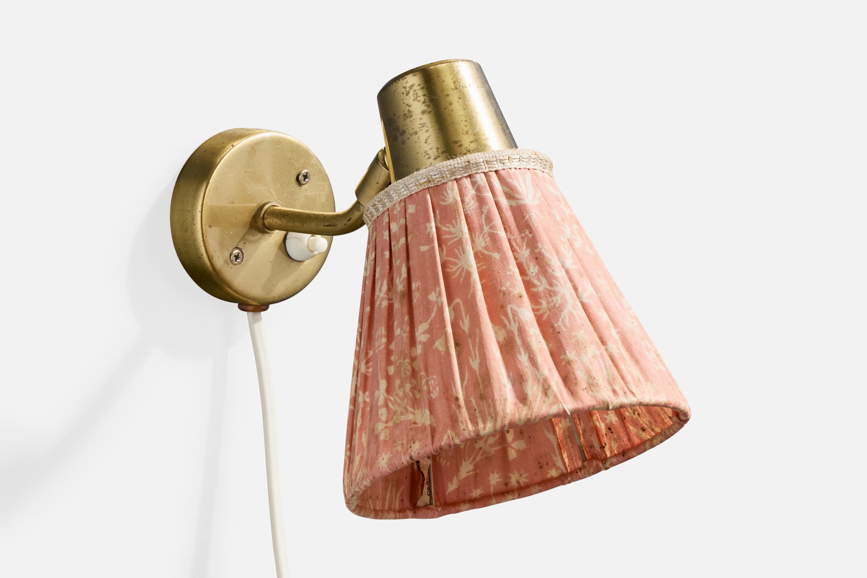 An adjustable brass and pink fabric wall light designed and produced in Sweden, c. 1940s.

Heavy oxidation present on brass, mildew/staining present on fabric shade.

Overall Dimensions (Inches): 7.0