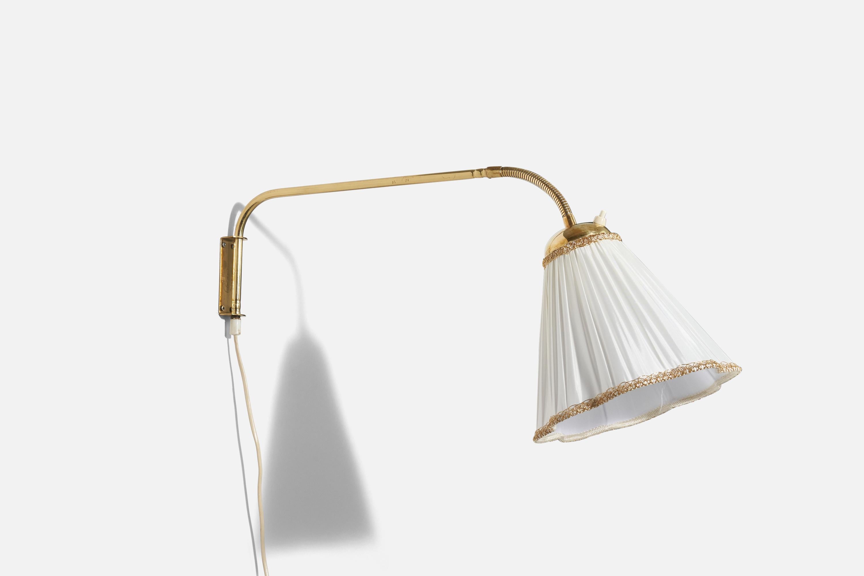 A brass and fabric wall light designed and produced in Sweden, c. 1940s.

Variable dimensions, measured as illustrated in the first image. 
Dimensions of back plate (inches) : (4 x 1.37 x .12) (H x W x D).