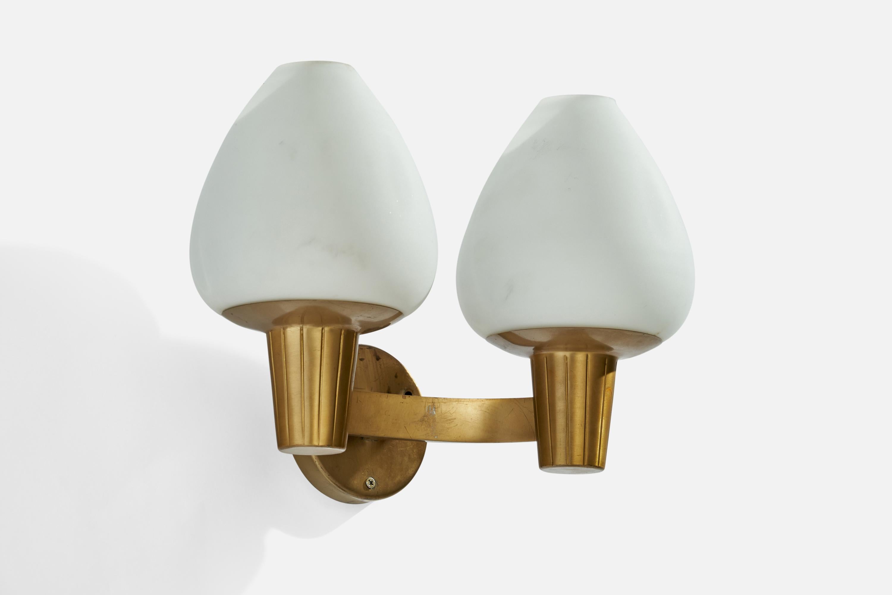 A brass and opaline glass wall light designed and produced in Sweden, 1940s.

Overall Dimensions (inches): 10.5”  H x 12” W x 6” D
Back Plate Dimensions (inches): 3.5”  H x 3.5”  W x .75” D
Bulb Specifications: E-26 Bulb
Number of Sockets: 2
All