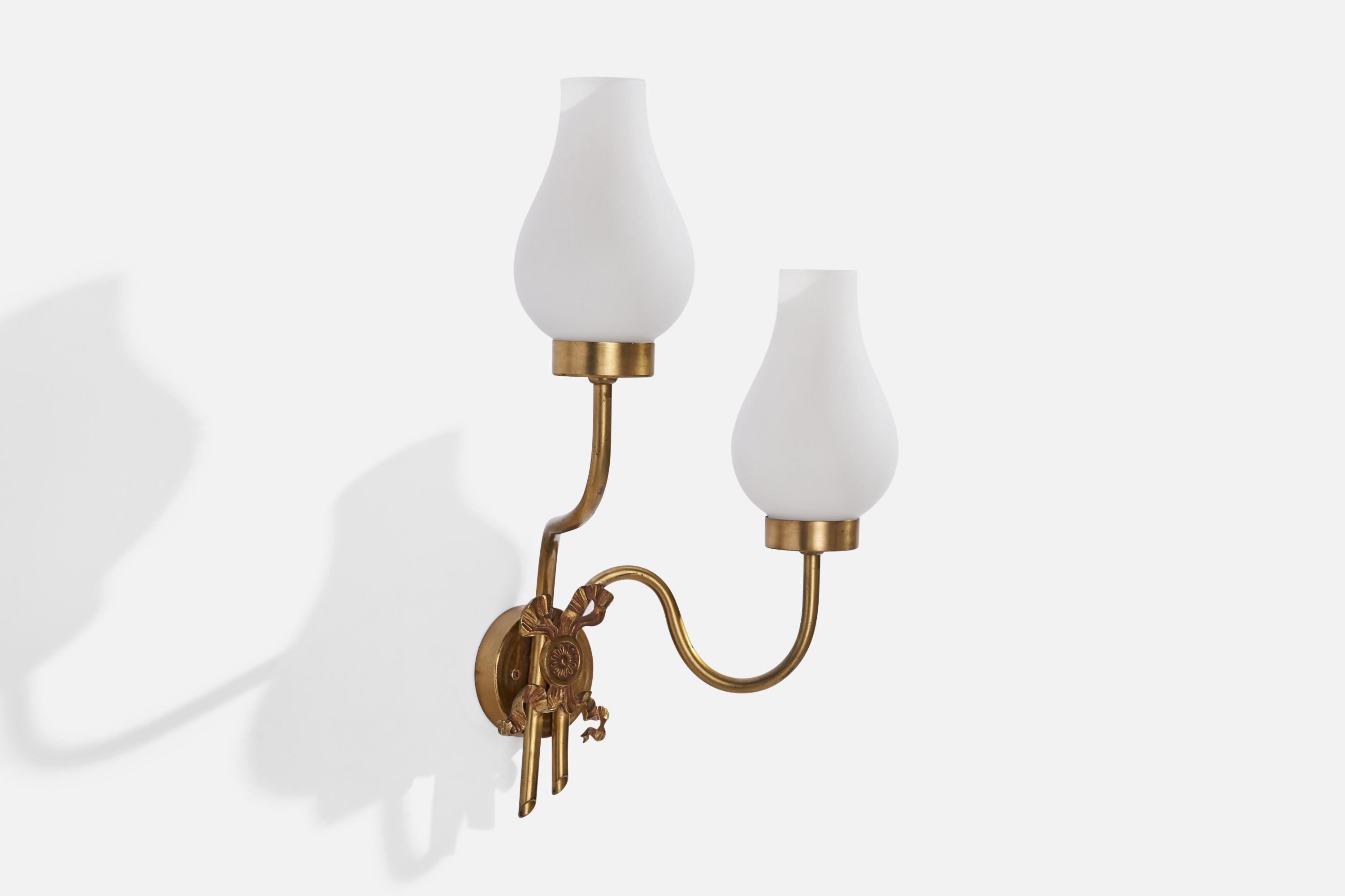 A two-armed brass and white opaline glass wall light designed and produced in Sweden, 1940s.

Overall Dimensions (inches): 15.5” H x 10” W x 6” D
Back Plate Dimensions (inches): 2.78” H x 0.68” D
Bulb Specifications: E-14 Bulb
Number of Sockets: