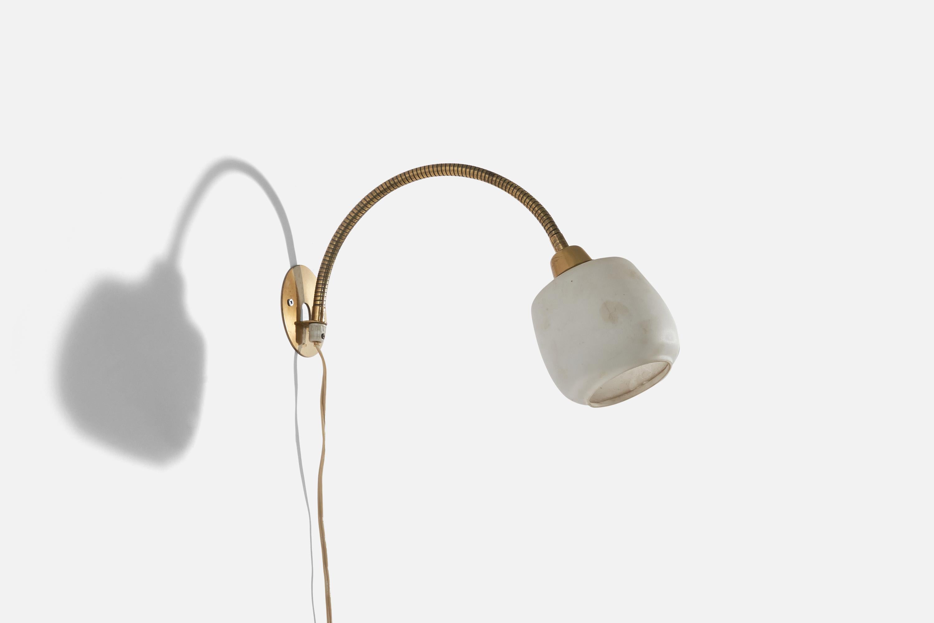 A brass and glass wall light designed and produced in Sweden, c. 1940s.

Variable dimensions, measured as illustrated in the first image. 

Dimensions of back plate (inches) : (3.81 x 3.81 x .06).