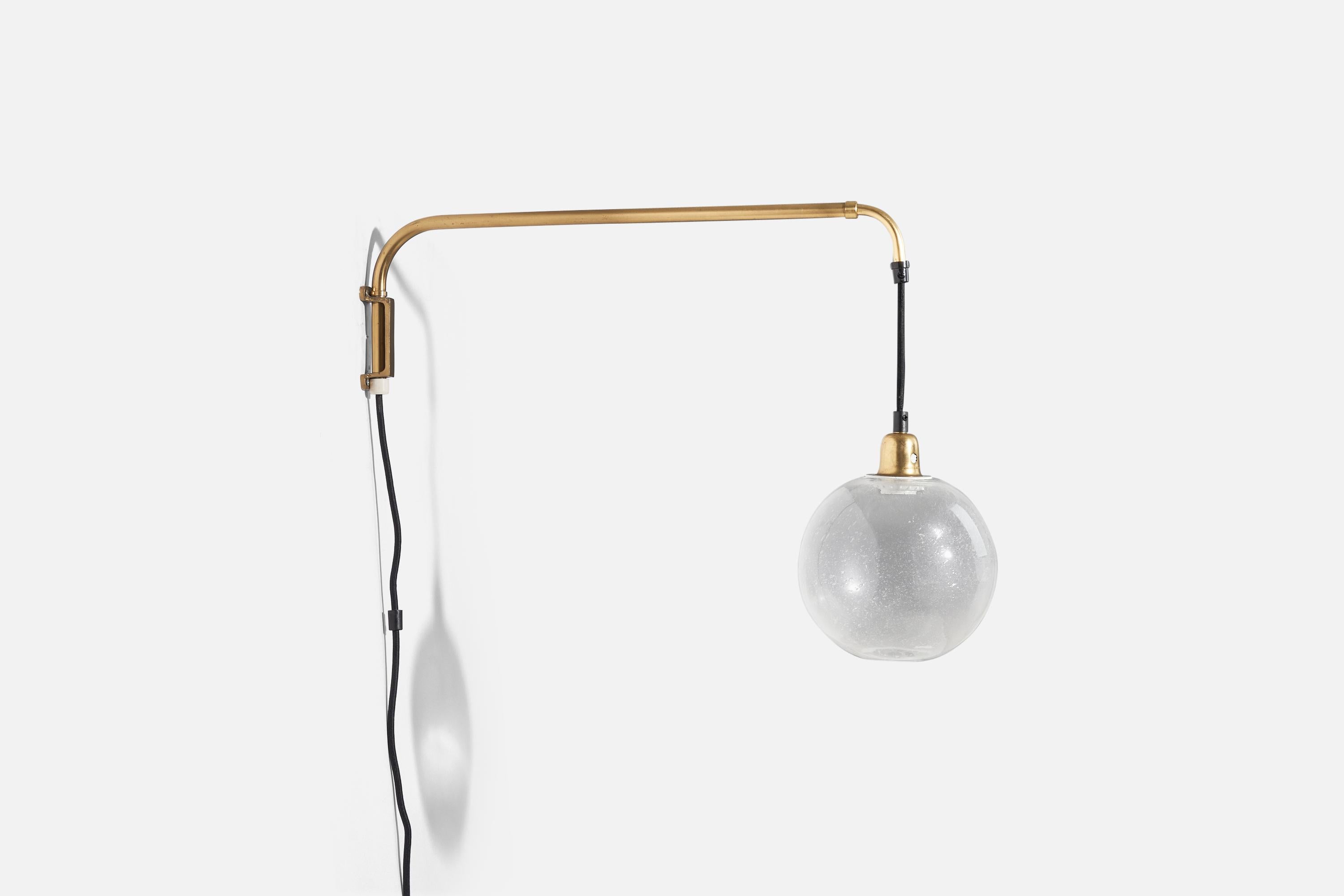 A brass and glass wall light designed and produced in Sweden, c. 1950s.

Variable dimensions, measured as illustrated in the first image.
 