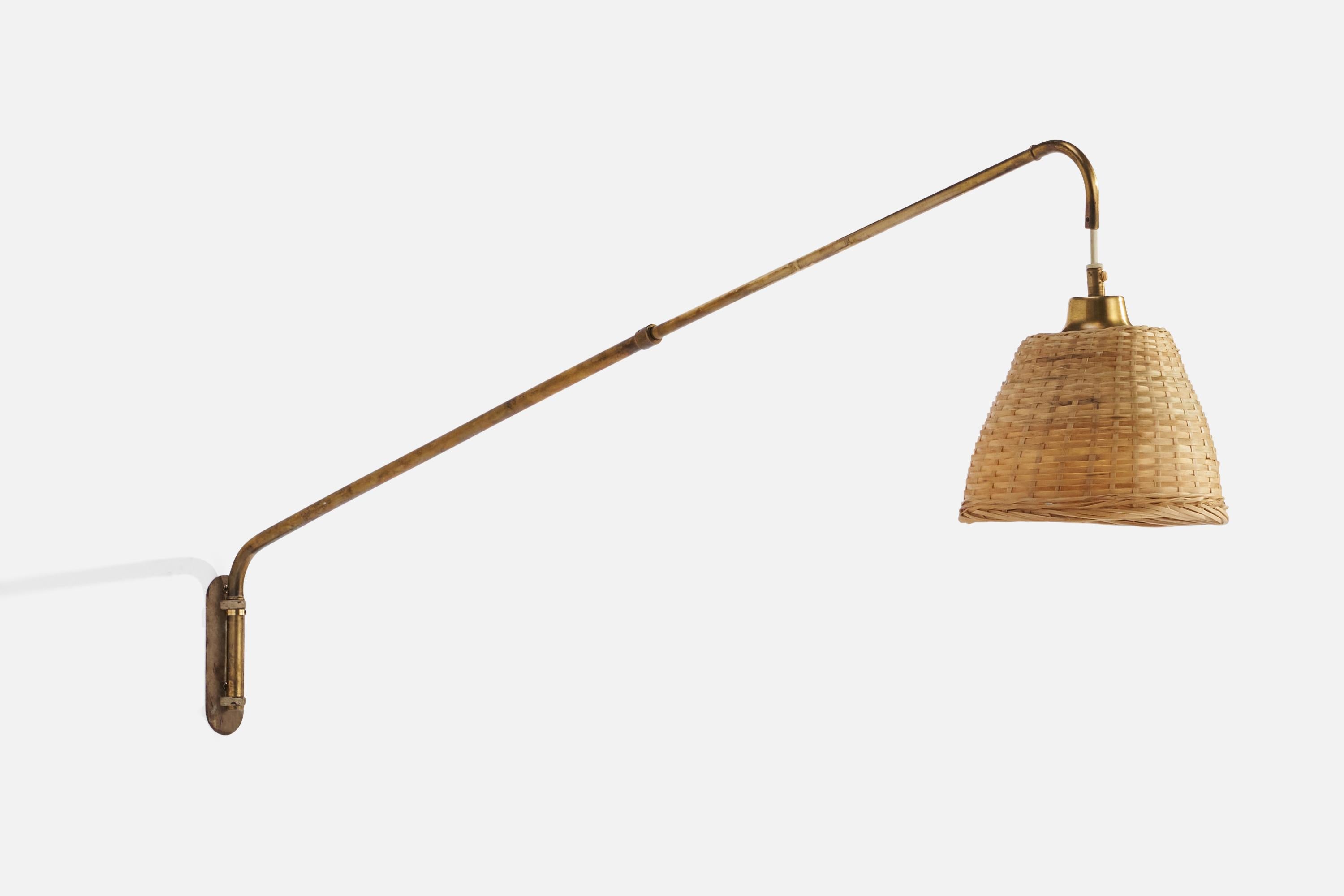 An adjustable brass and rattan wall light designed and produced in Sweden, 1940s.

Overall Dimensions (inches): 6.8” H x 18.5” W x 39.5” D
Back Plate Dimensions (inches): 5” H x 1.5” W x .25” D
Bulb Specifications: E-26 Bulb
Number of Sockets: 1
All