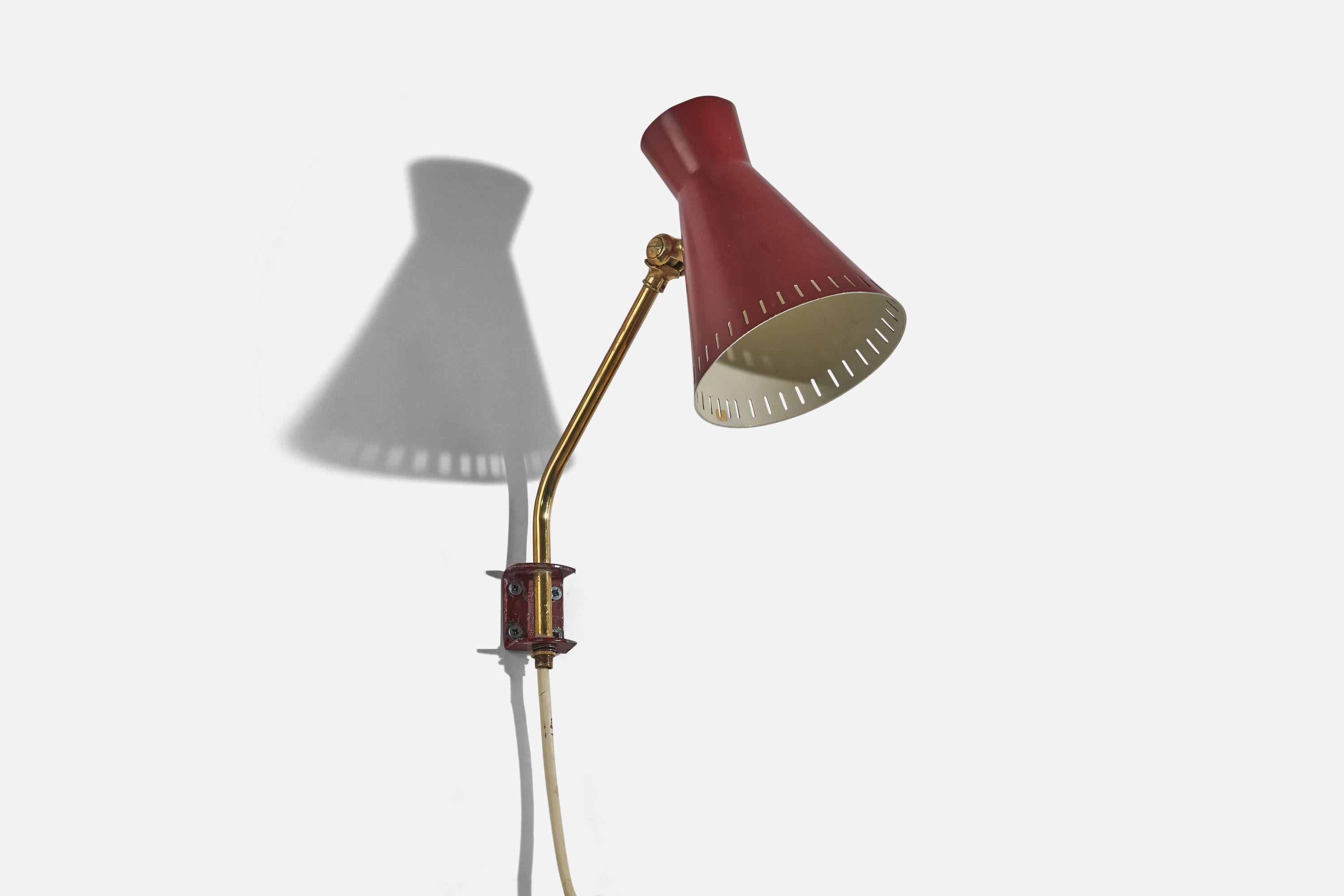 A brass and red lacquered metal wall light designed and produced in Sweden, c. 1940s.

Dimensions of back plate (inches) : 1.75 x 1.3125 x .9375 (H x W x D).