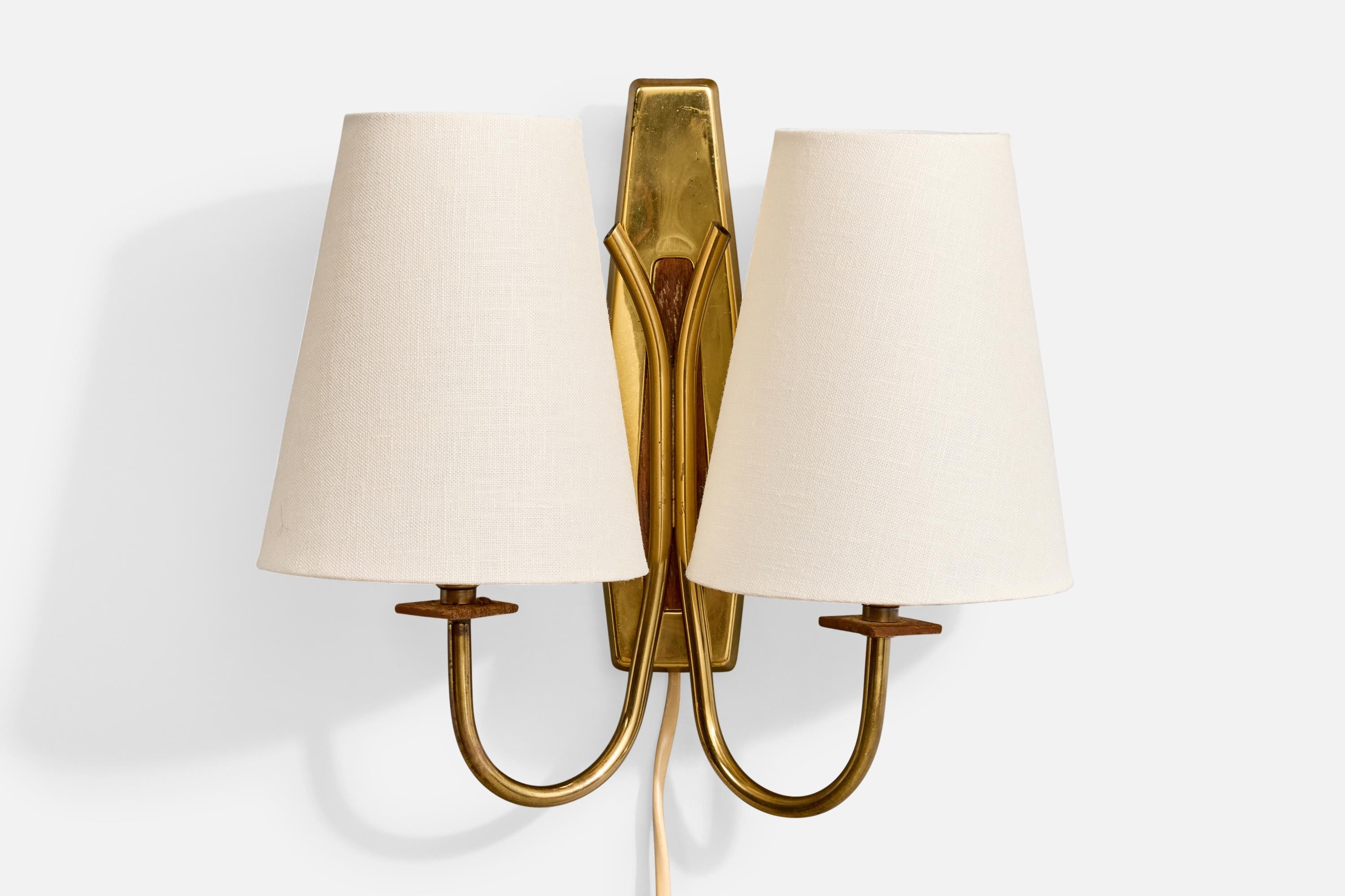 A brass, teak and white fabric wall light designed and produced in Sweden, c. 1950s.

Overall Dimensions (Inches): 9.875