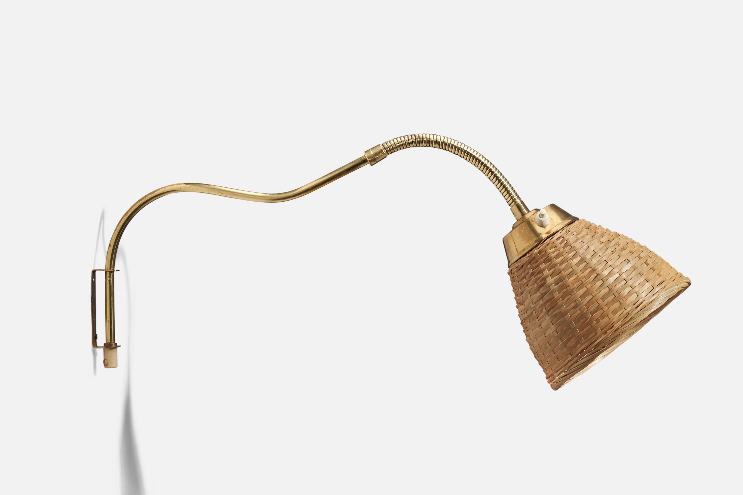 A brass and rattan wall light designed and produced in Sweden, 1940s

Takes one lightbulb on E26 socket. No stated max wattage, not UL listed.

Sold with Lampshade. Dimensions stated are of Sconce with Lampshade.