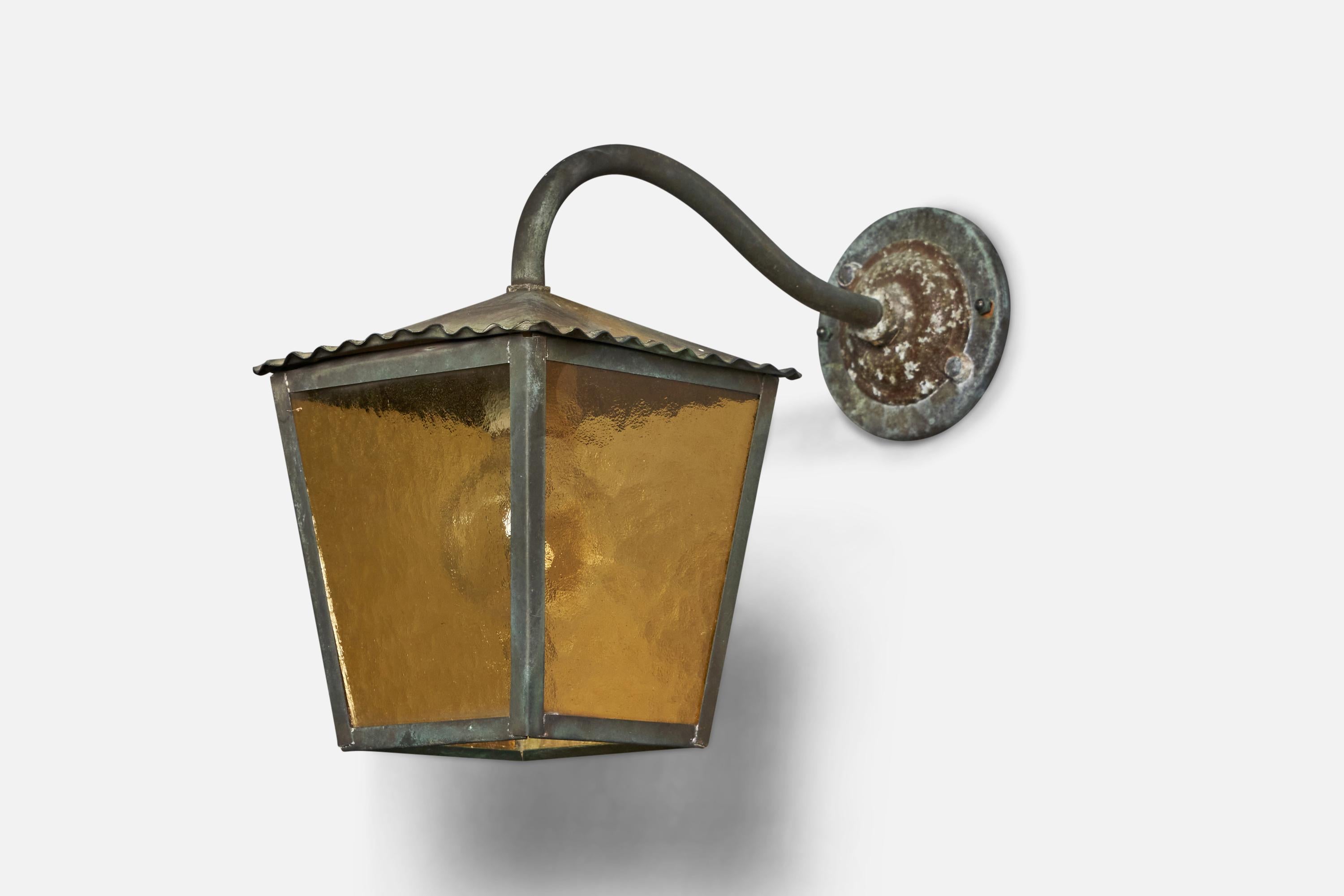 A patinated copper and yellow-coloured glass wall light designed and produced in Sweden, 1940s.

Overall Dimensions (inches): 11.5” H x 7.5” W x 15.15” D
Back Plate Dimensions (inches): 4.8” Diameter
Bulb Specifications: E-26 Bulb
Number of Sockets: