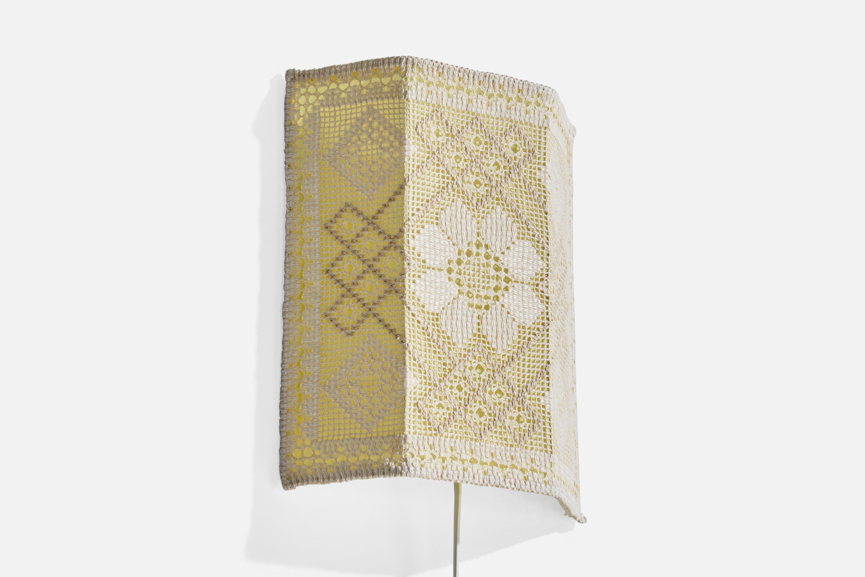 An off-white embroidery fabric and metal wall light designed and produced in Sweden, c. 1960s.

Overall Dimensions (Inches): 10.5