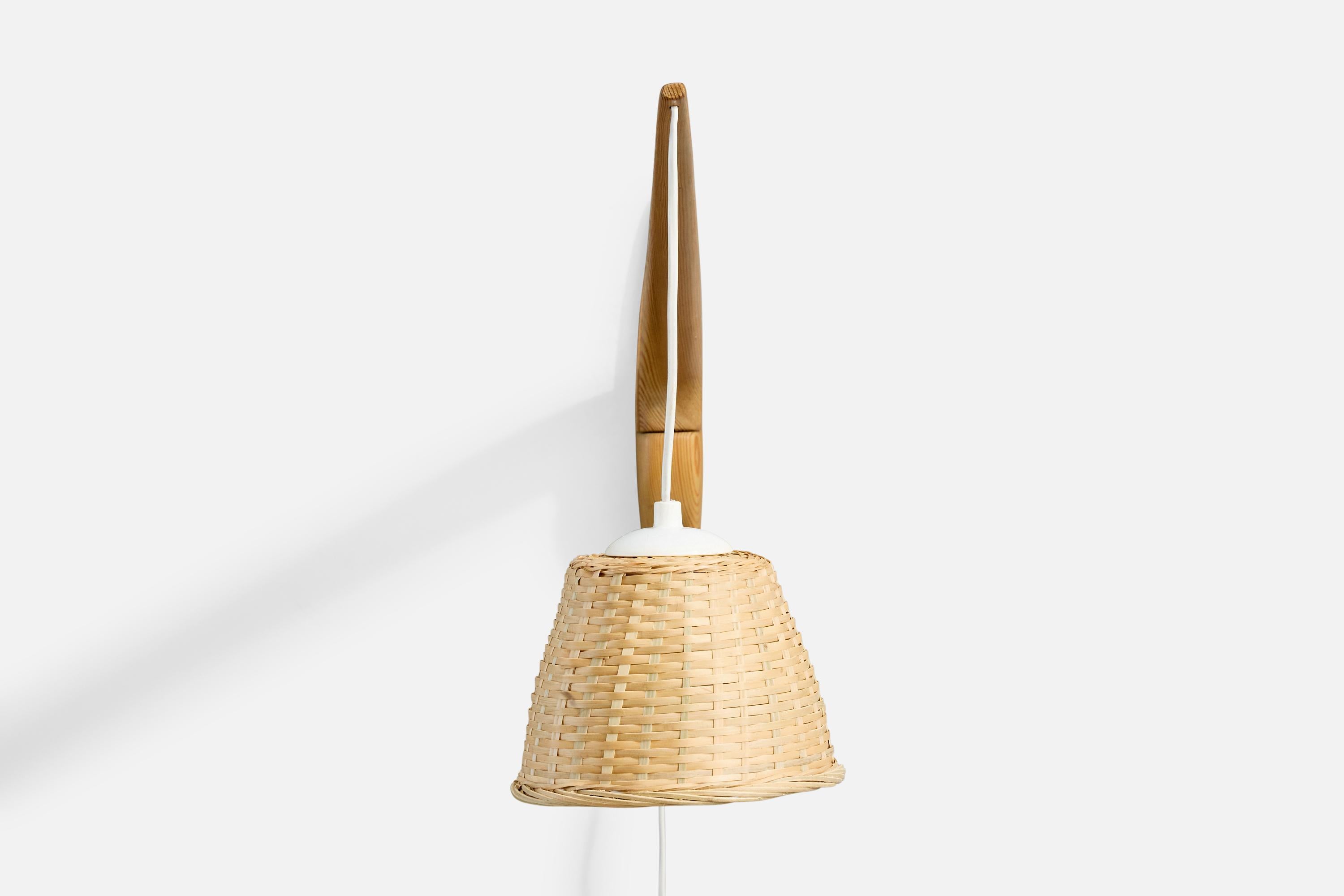 Mid-Century Modern Swedish Designer, Wall Light, Pine, Rattan, Sweden, 1970s For Sale