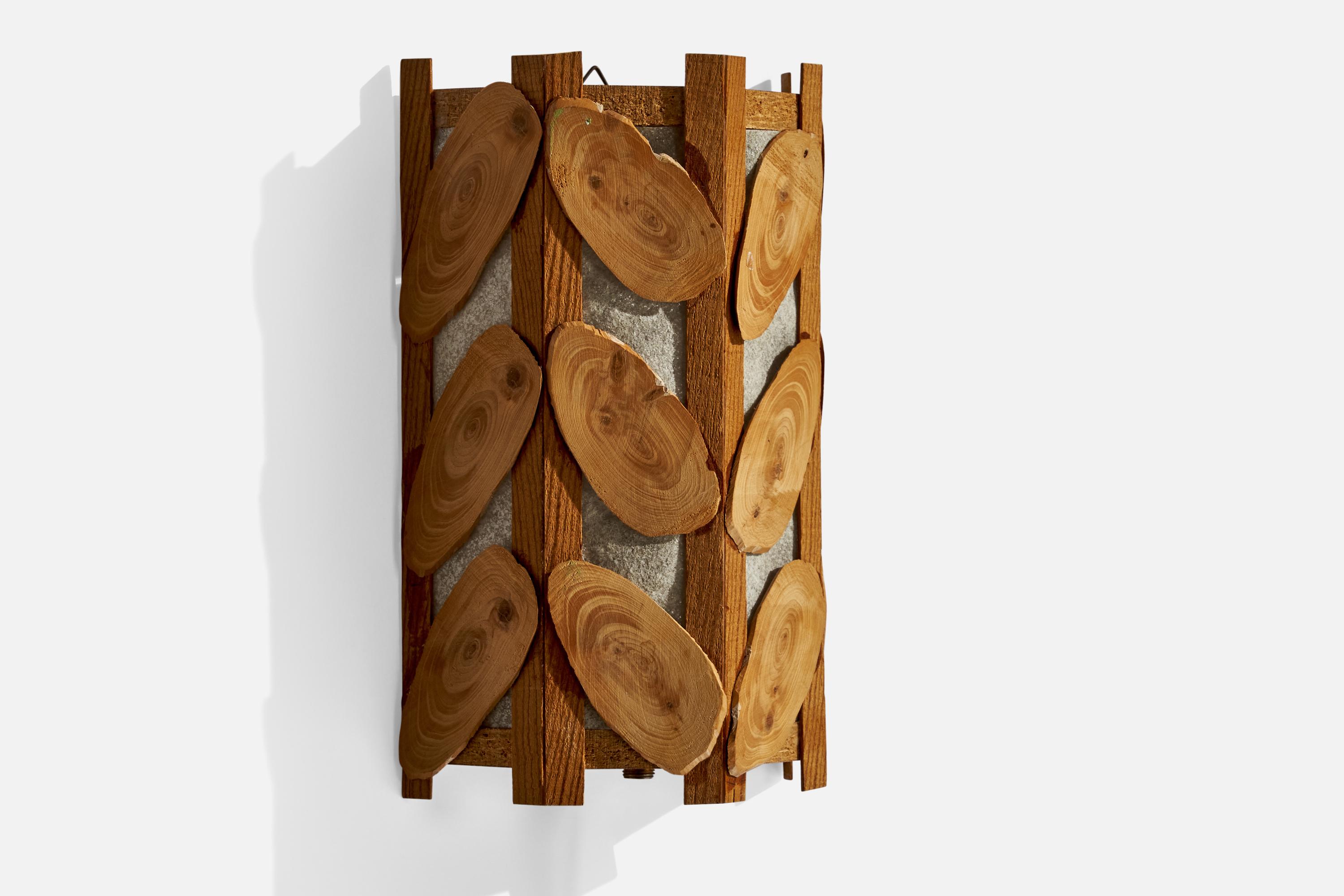 A pine and fabric wall light designed and produced in Sweden, 1970s.

Overall Dimensions (inches): 8.5” H x 5.5”  W x 2.75”  D
Back Plate Dimensions (inches): N/A
Bulb Specifications: E-14 Bulb
Number of Sockets: 1
All lighting will be converted for