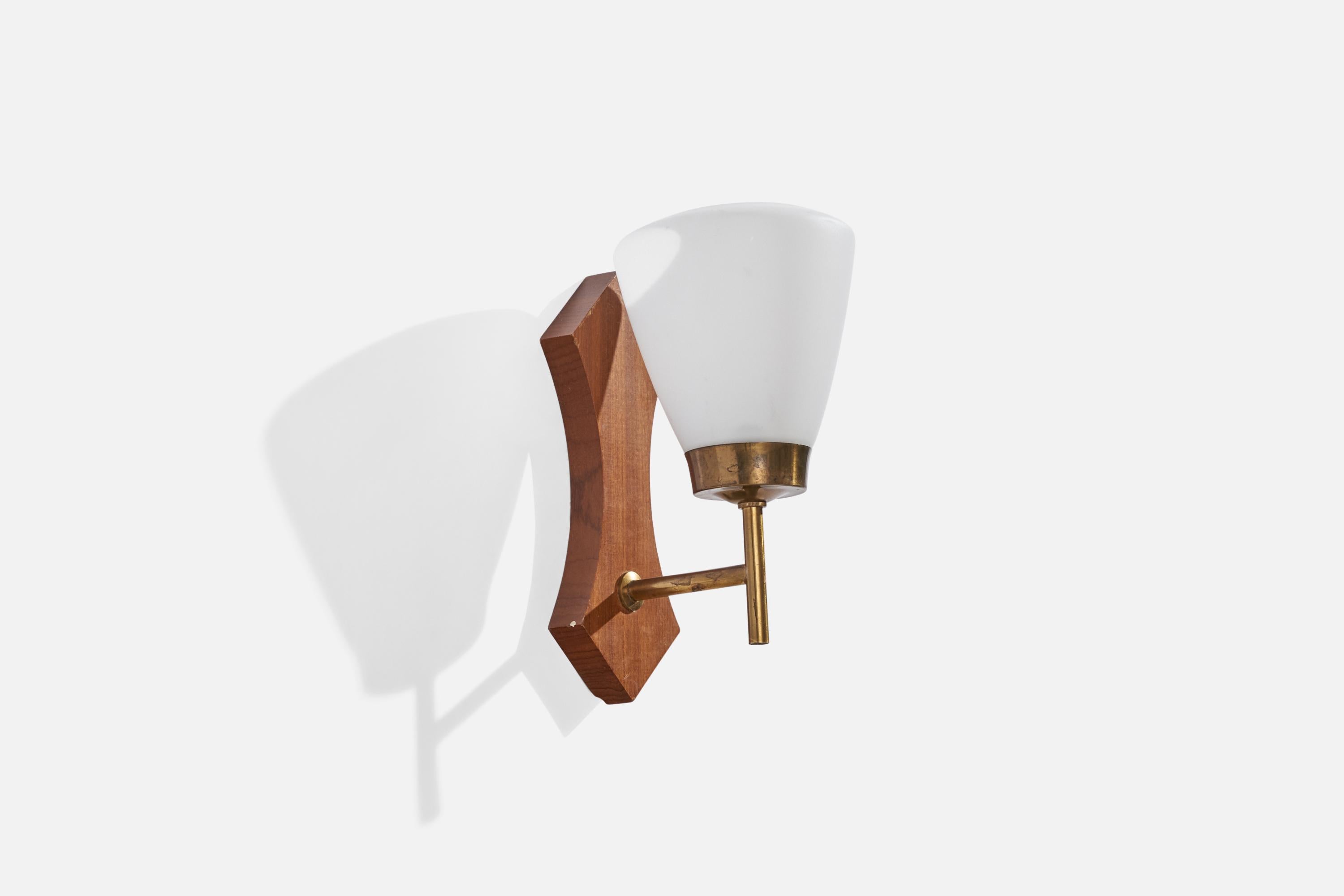A teak, brass and opaline glass wall light designed and produced in Sweden, c. 1950s.

Overall Dimensions (inches): 8.25” H x 3.55” W x 4.98” D
Back Plate Dimensions (inches): 7.75” H x 2.91” W x 0.82” D
Bulb Specifications: E-14 Bulb
Number of