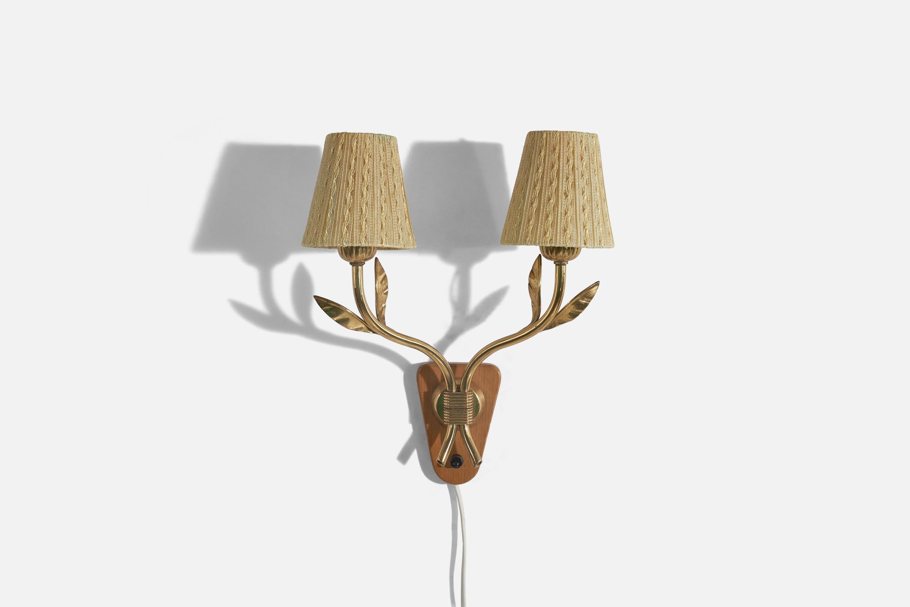 A brass, wood and fabric wall light designed and produced in Sweden, c. 1940s.

Sold with Lampshade. 
Stated dimensions refer to the Sconce with the Shade.
Dimensions of back plate (inches) : 4.7 x 4.7 x 1.12 (H x W x D).