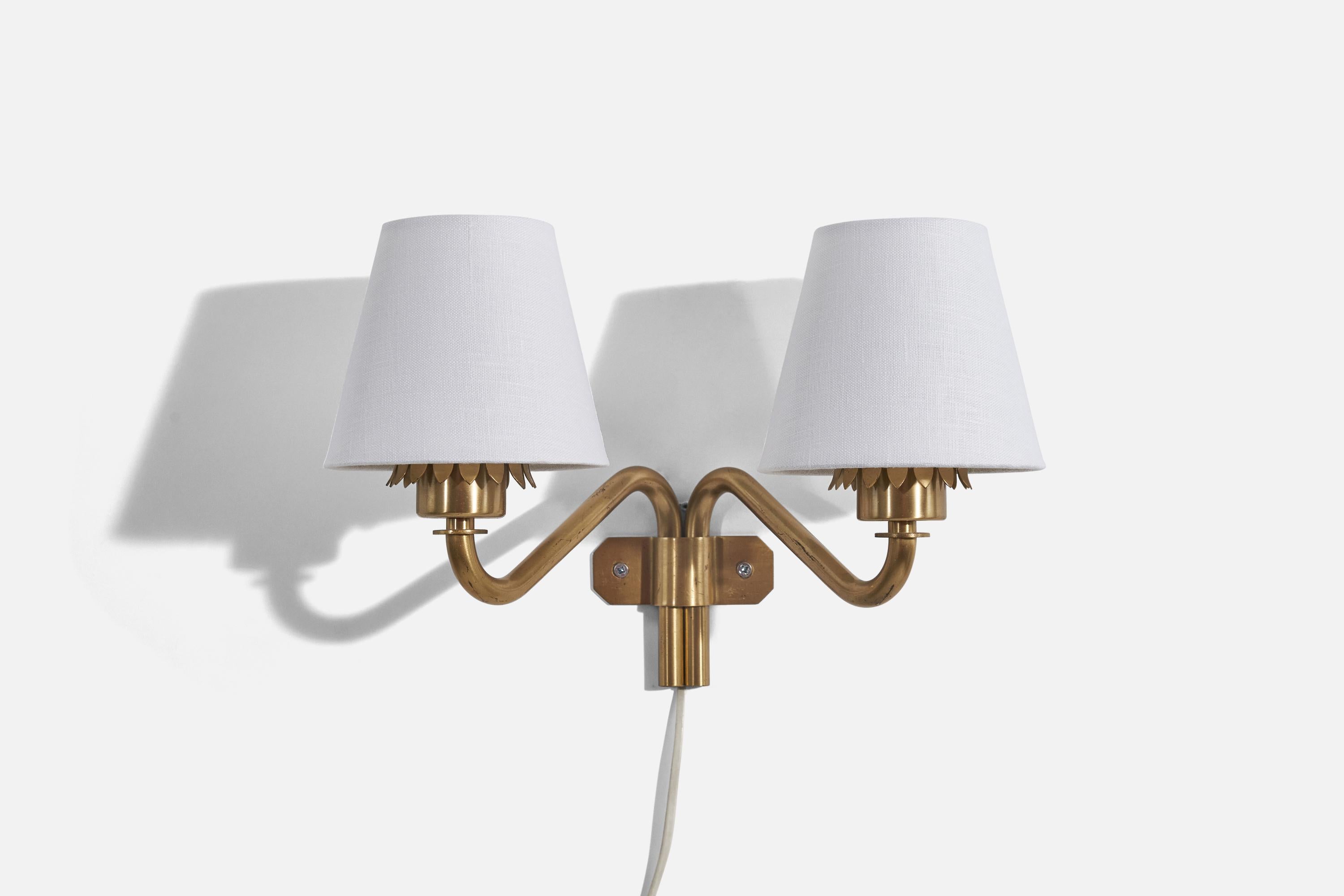 A pair of brass and fabric wall lights designed and produced in Sweden, c. 1940s.

Sold with lampshade. 
Stated dimensions refer to the Sconce with the Shade. 

Dimensions of back plate (inches) : (4.5 x 4.5 x .87).