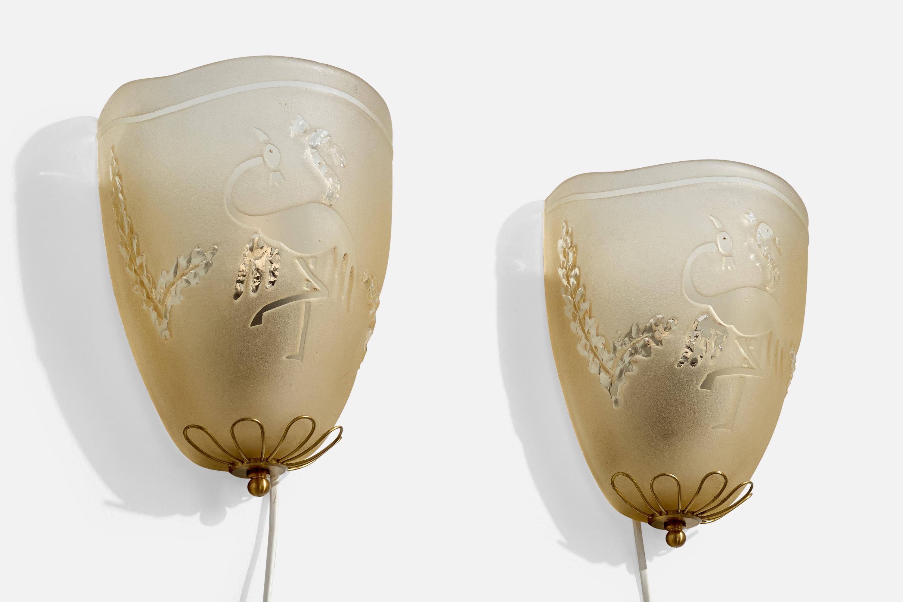 A pair of brass and etched beige glass wall lights designed and produced in Sweden, c. 1940s.

Overall Dimensions (Inches): 10.5” H x 7” W x 4.8“ D

Back Plate Dimensions (Inches): 6.25” H x 1.1“ W x .125” D

Bulb Specifications: E-26

Number of
