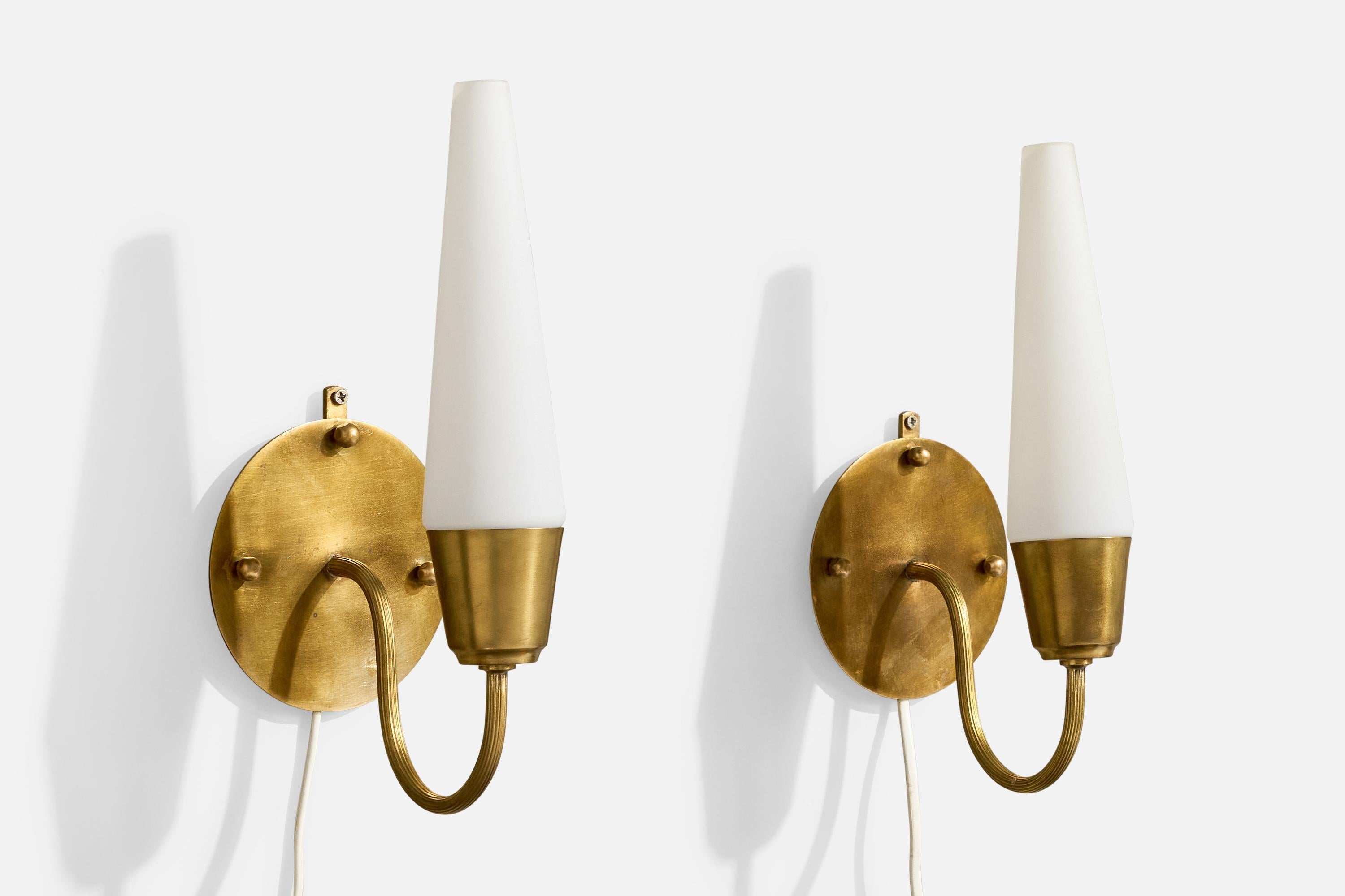 A pair of brass and white opaline glass wall lights designed and produced in Sweden, c. 1960s.

Overall Dimensions (Inches): 11” H x 4.5” W x 5.25“ D

Back Plate Dimensions (Inches): 4.5” H x 4.5” W x .05“ D

Bulb Specifications: E-14

Number of