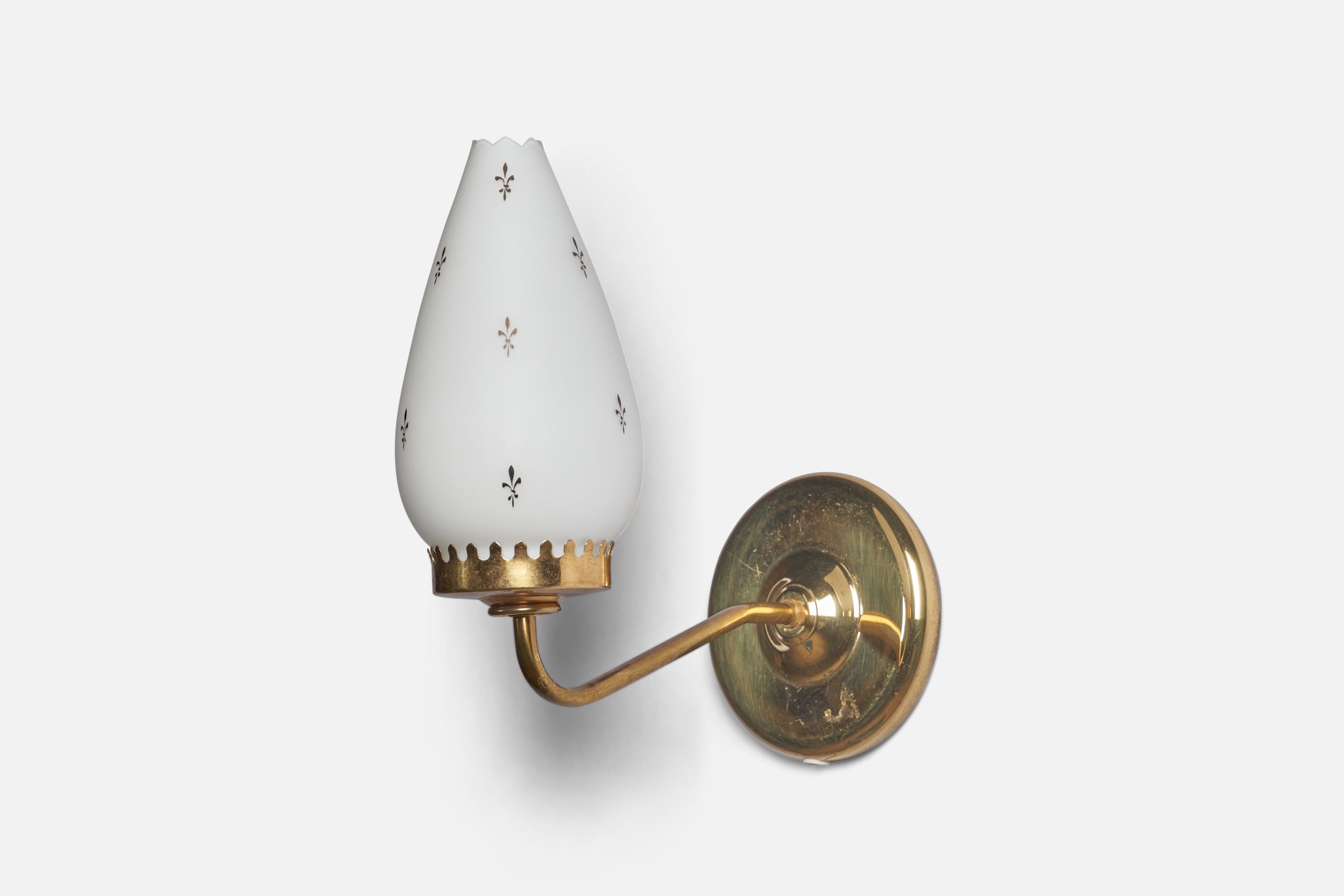 A pair of brass and decorated white glass wall lights, designed and produced in Sweden, c. 1970s.

Overall Dimensions: 11.5