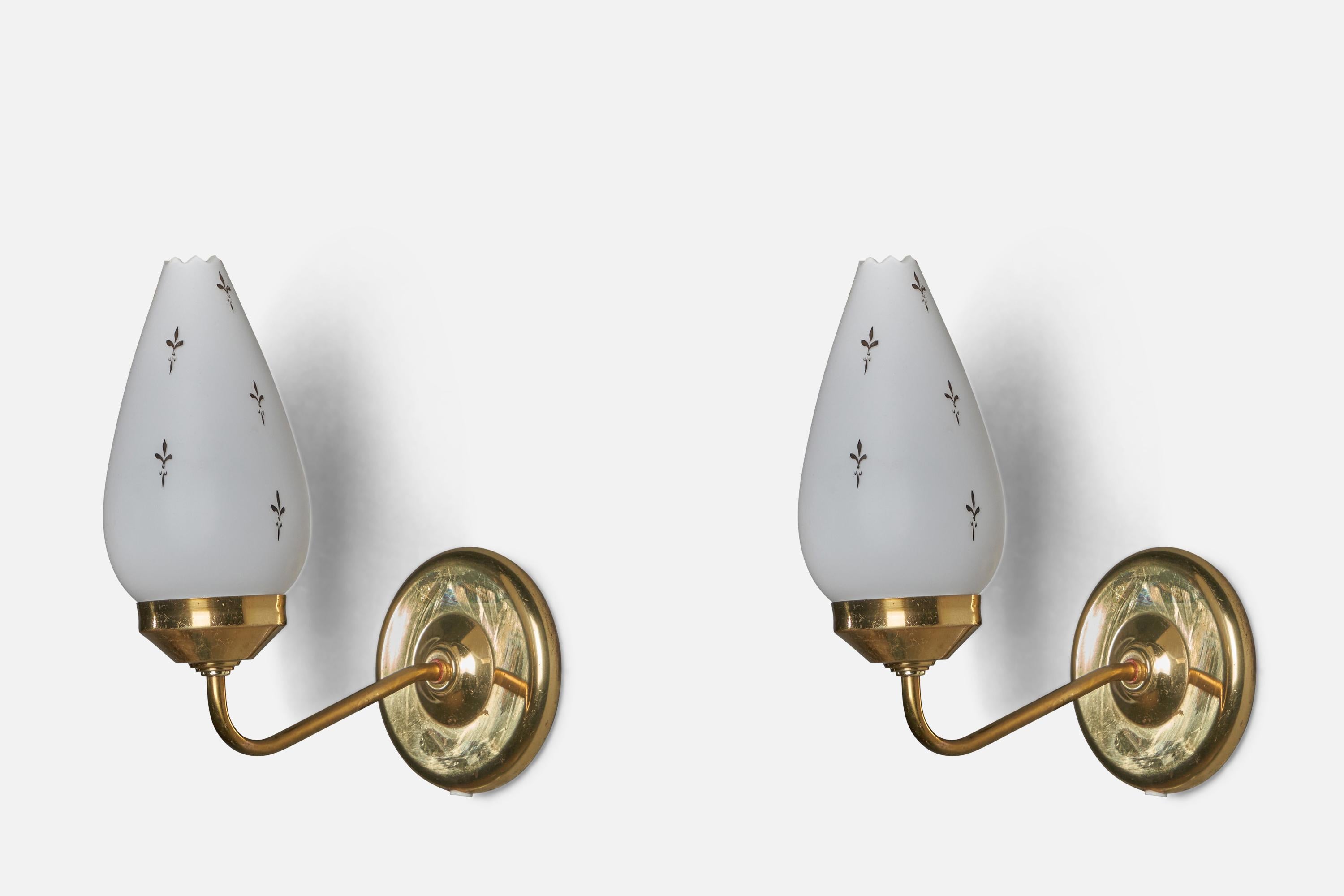 A pair of brass and opaline glass wall lights designed and produced in Sweden, 1970s.

Overall Dimensions (inches): 11.5” H x 5” W x 9” D
Back Plate Dimensions (inches): 5” Diameter x 0.75” D
Bulb Specifications: E-26 Bulb
Number of Sockets: 1
