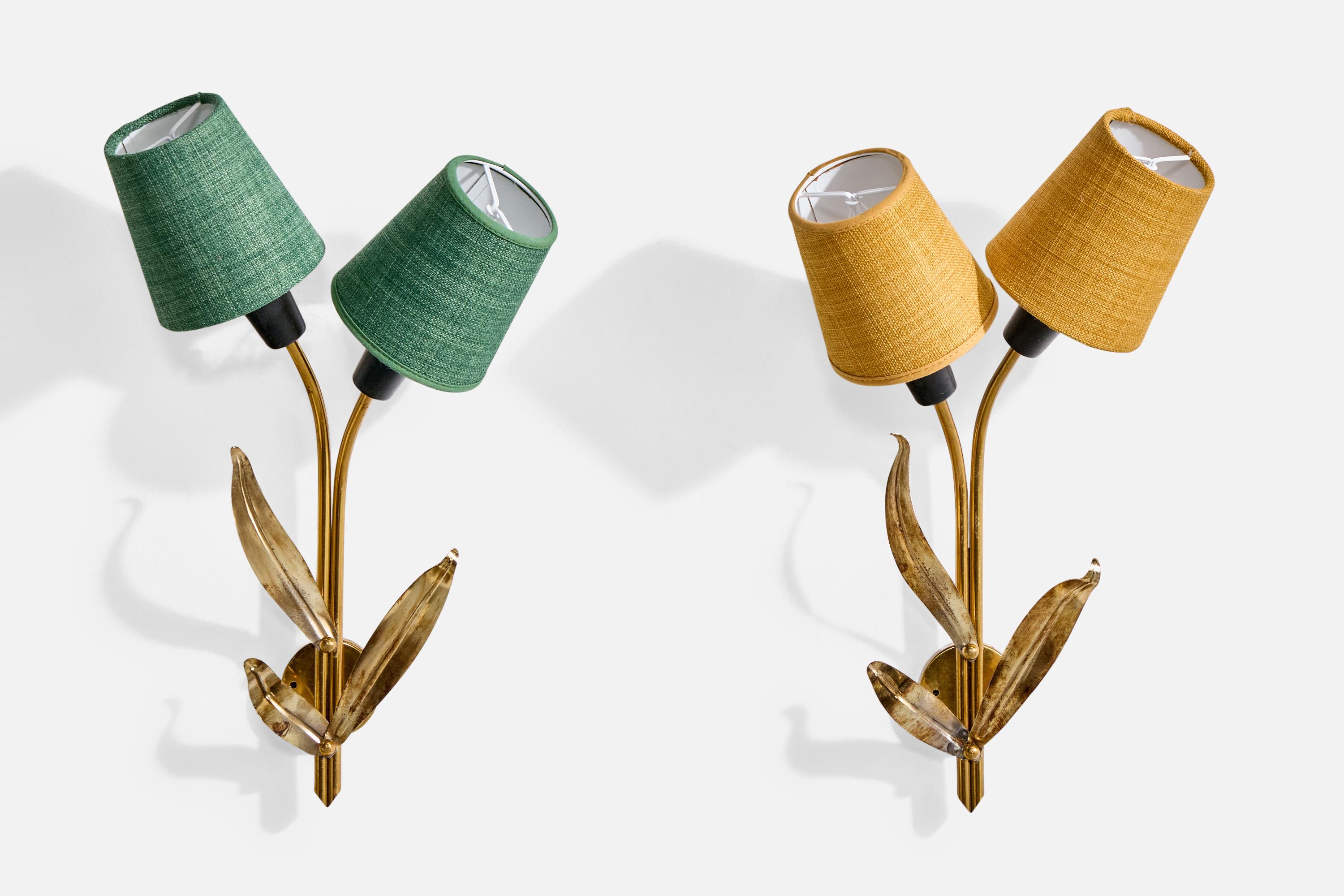 A pair of brass, metal and green, yellow fabric wall lights designed and produced in Sweden, c. 1950s.

Overall Dimensions (inches): 16.5” H x 10” W x 4.875“ D

Back Plate Dimensions (Inches):  2.25” H x 2.25” W x .75” D

Bulb Specifications: