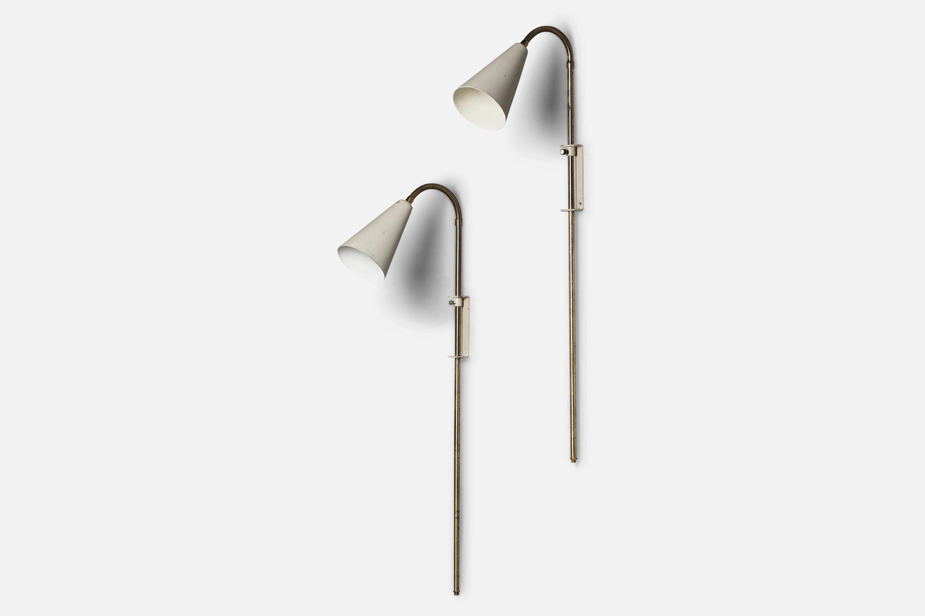 A pair of adjustable brass and white-lacquered metal wall lights, designed and produced in Sweden, 1950s.

Note that cord runs from bottom of stem, functioning via plug in. Not convertible to hardwire.

Overall Dimensions (inches): 33.25