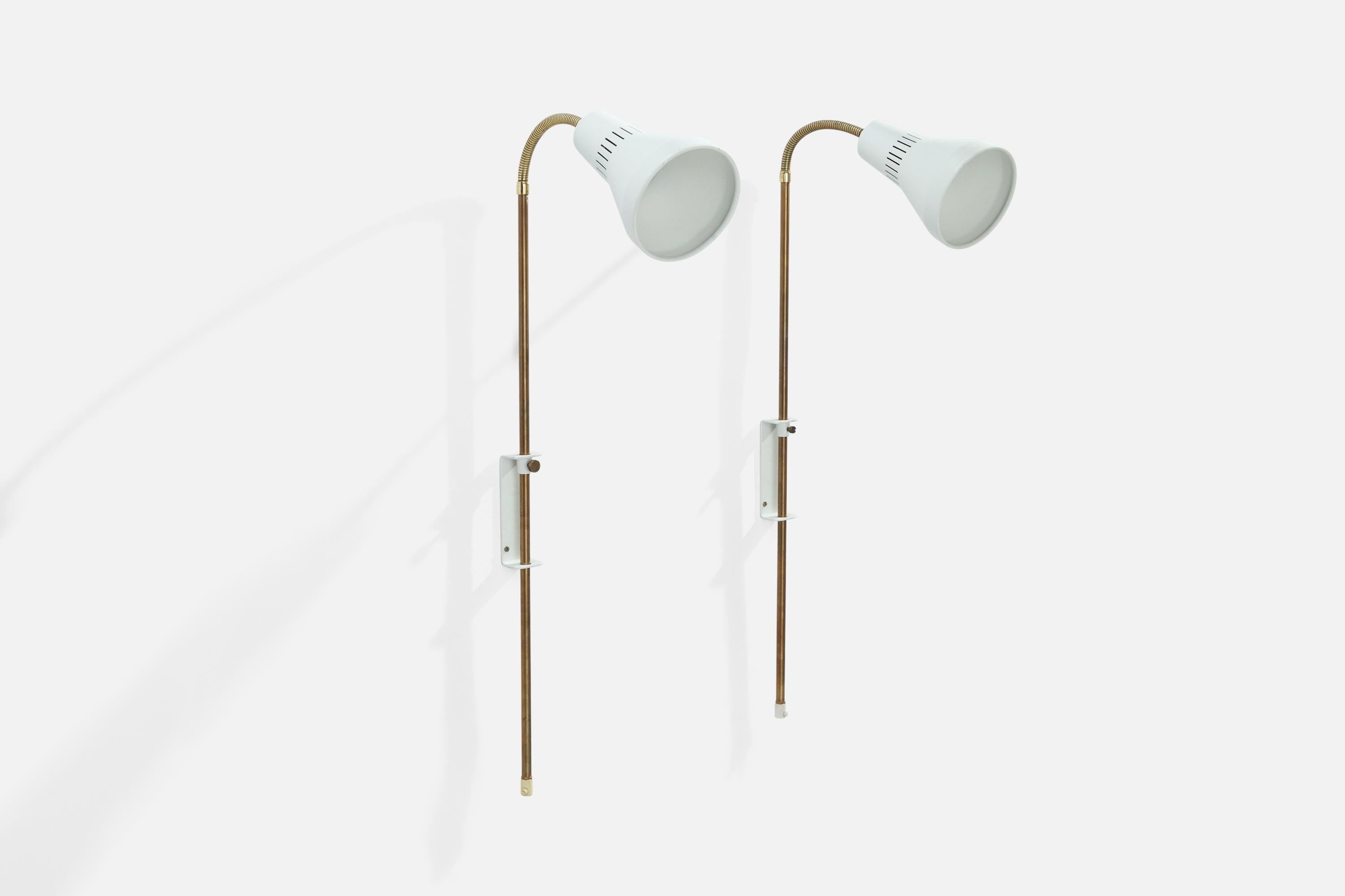 A pair of adjustable brass and white-lacquered metal wall lights designed and produced in Sweden, 1950s.

Dimensions variable.
Overall Dimensions (inches): 42”  H x 5” W x 11”  D
Back Plate Dimensions (inches): 5” H x 1.5”  W x 1.25” D
Bulb