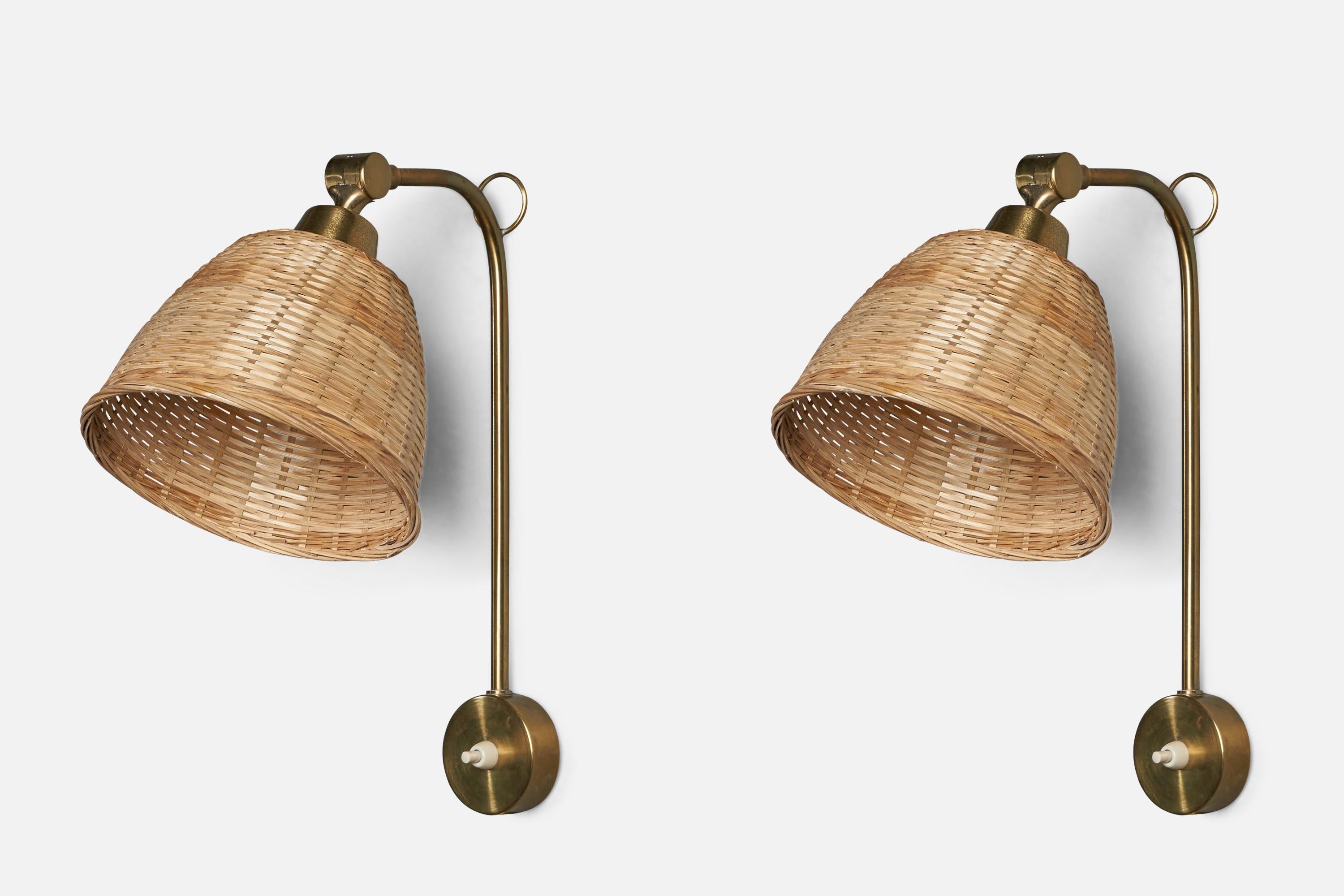A pair of brass and rattan wall lights designed and produced in Sweden, 1960s.

Overall Dimensions (inches): 13.5” H x 6.75” W x 14” D
Back Plate Dimensions (inches): 2.5” Diameter x 0.8” D
Bulb Specifications: E-26 Bulb
Number of Sockets: 1
”AB öB”