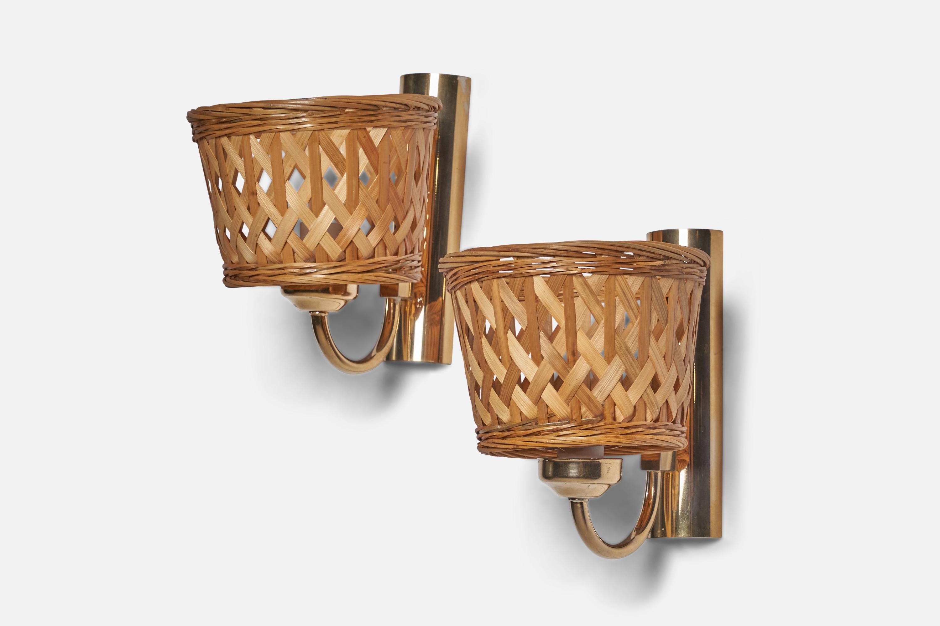 
A pair of brass and rattan wall lights designed and produced in Sweden, 1970s.
Overall Dimensions (inches): 7.5” H x 6.25” W x 7.5” D
Back Plate Dimensions (inches): 7.25” H x 2” W x 0.8” D
Bulb Specifications: E-14 Bulb
Number of Sockets: 1
All
