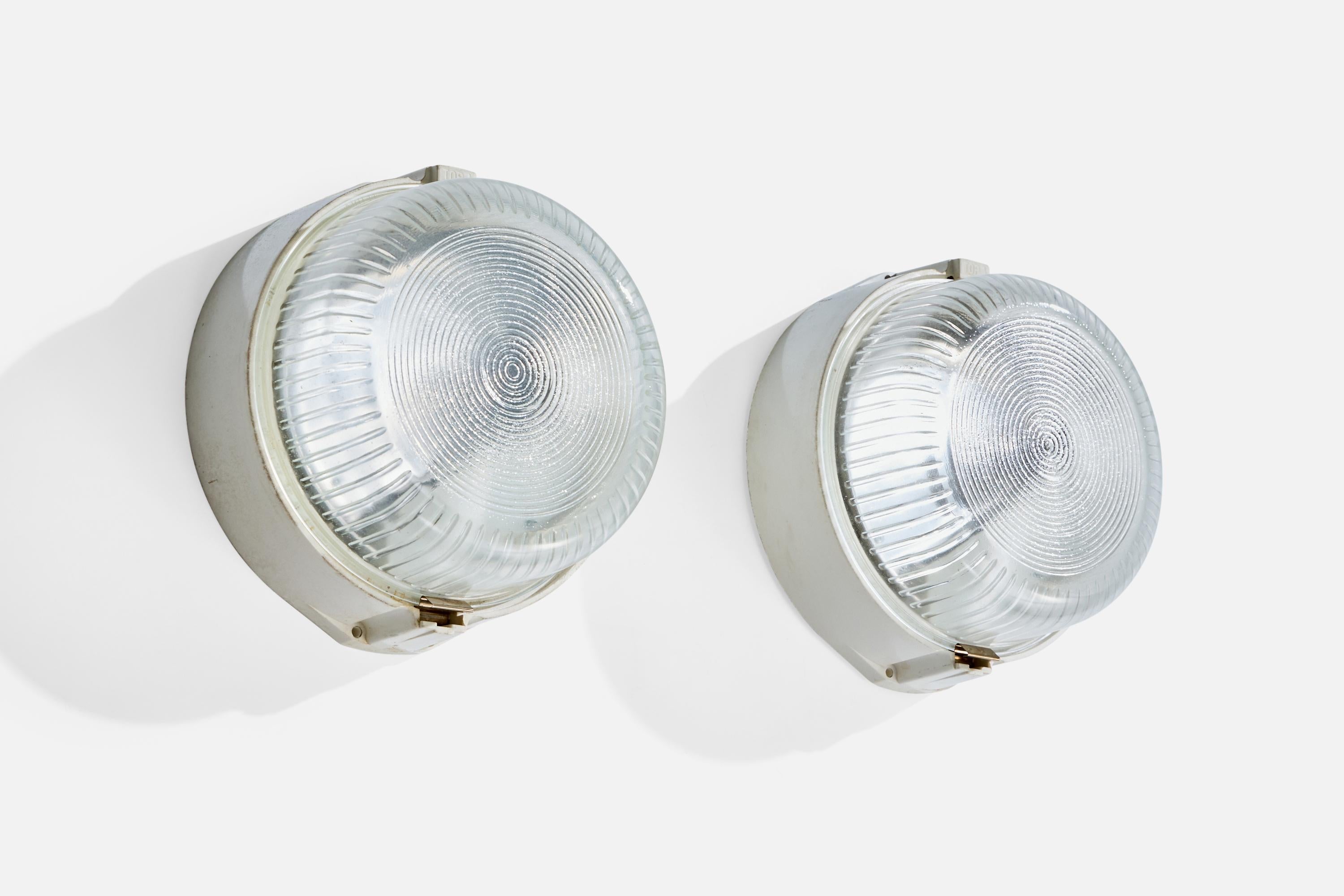 A pair of glass and plastic wall lights or flush mounts likely designed and produced in Sweden, c. 1960s.

Overall Dimensions (Inches): 8.25