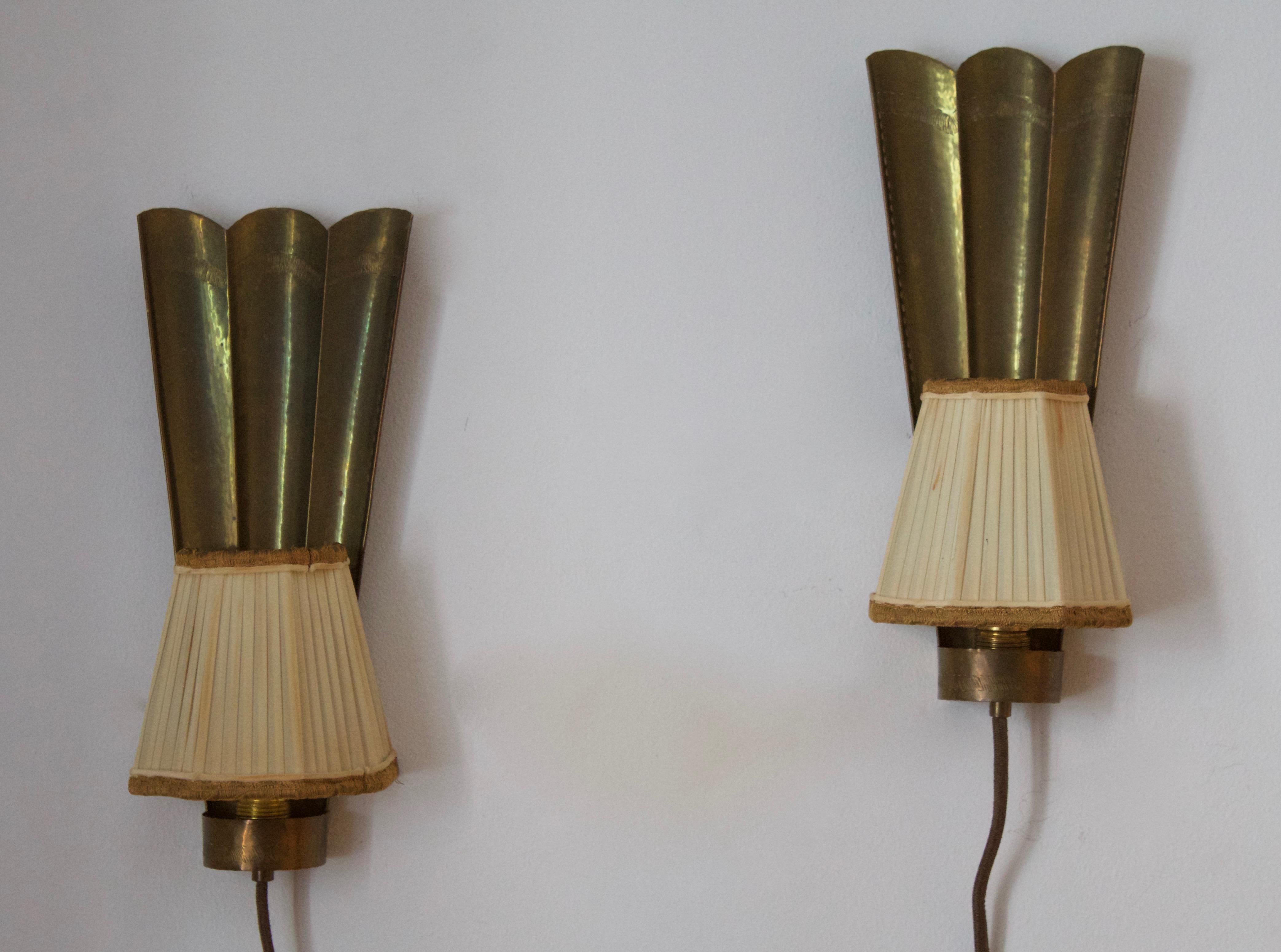 A pair of wall lights / sconces. Designed and produced in Sweden, c. 1940s. 

With vintage lampshades.

Other designers of the period include Paavo Tynell, Jean Royère, Hans Bergström, Hans-Agne Jakobsson, and Kaare Klint.

 