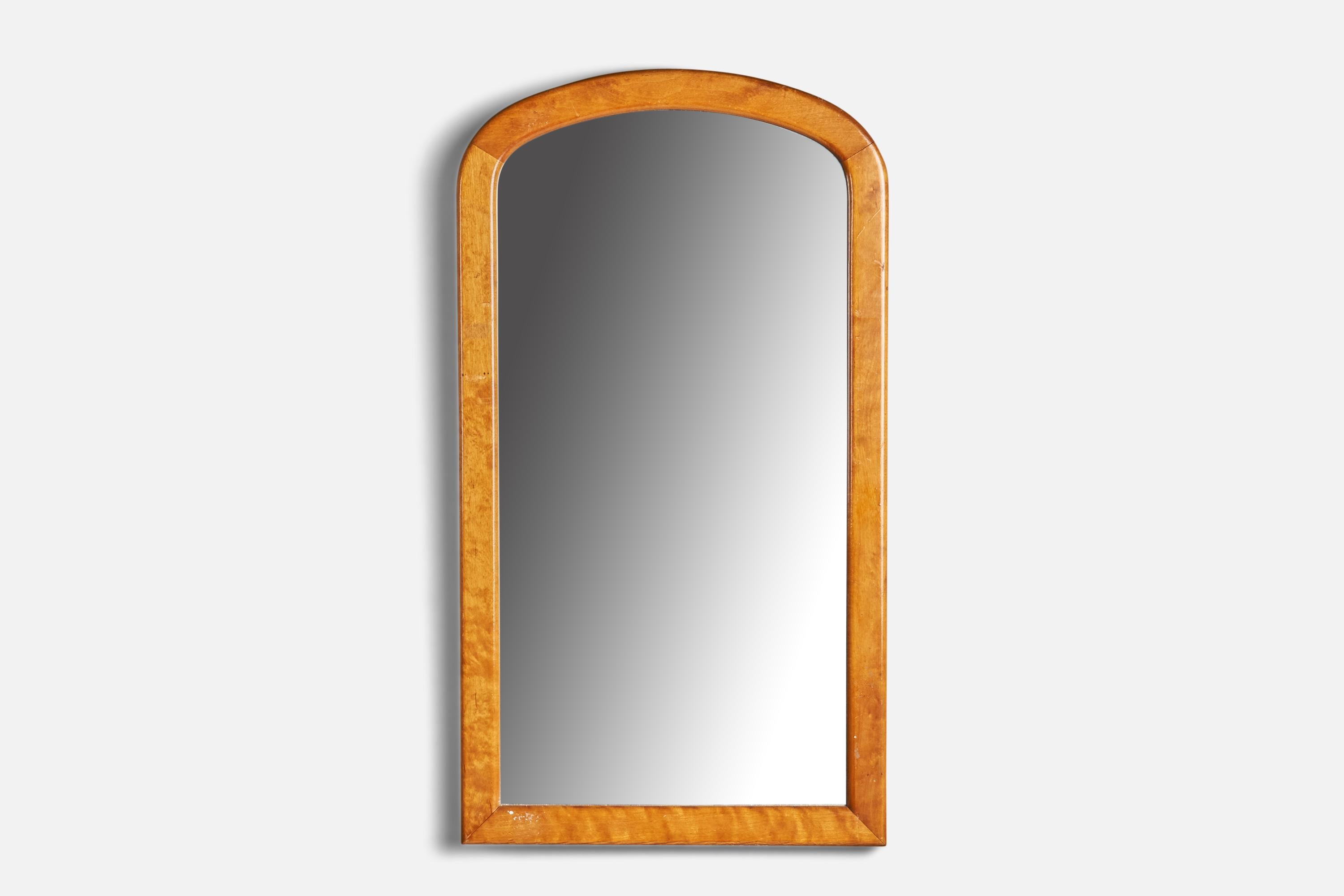 A birch wall mirror designed and produced in Sweden, c. 1920s.