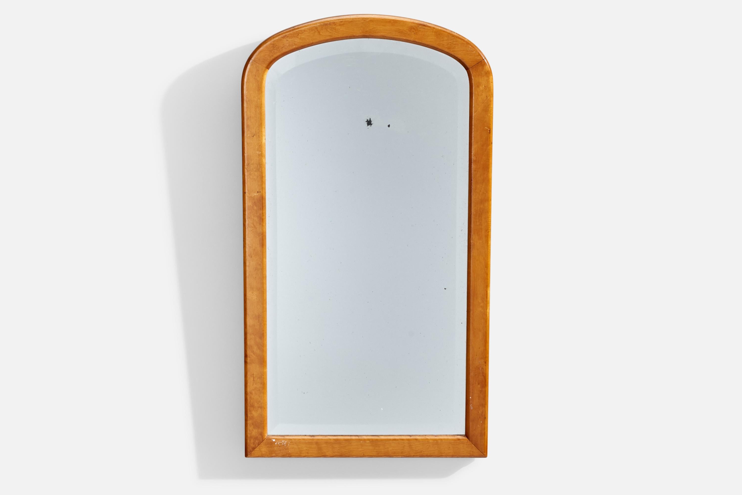 A birch wall mirror designed and produced in Sweden, c. 1920s.