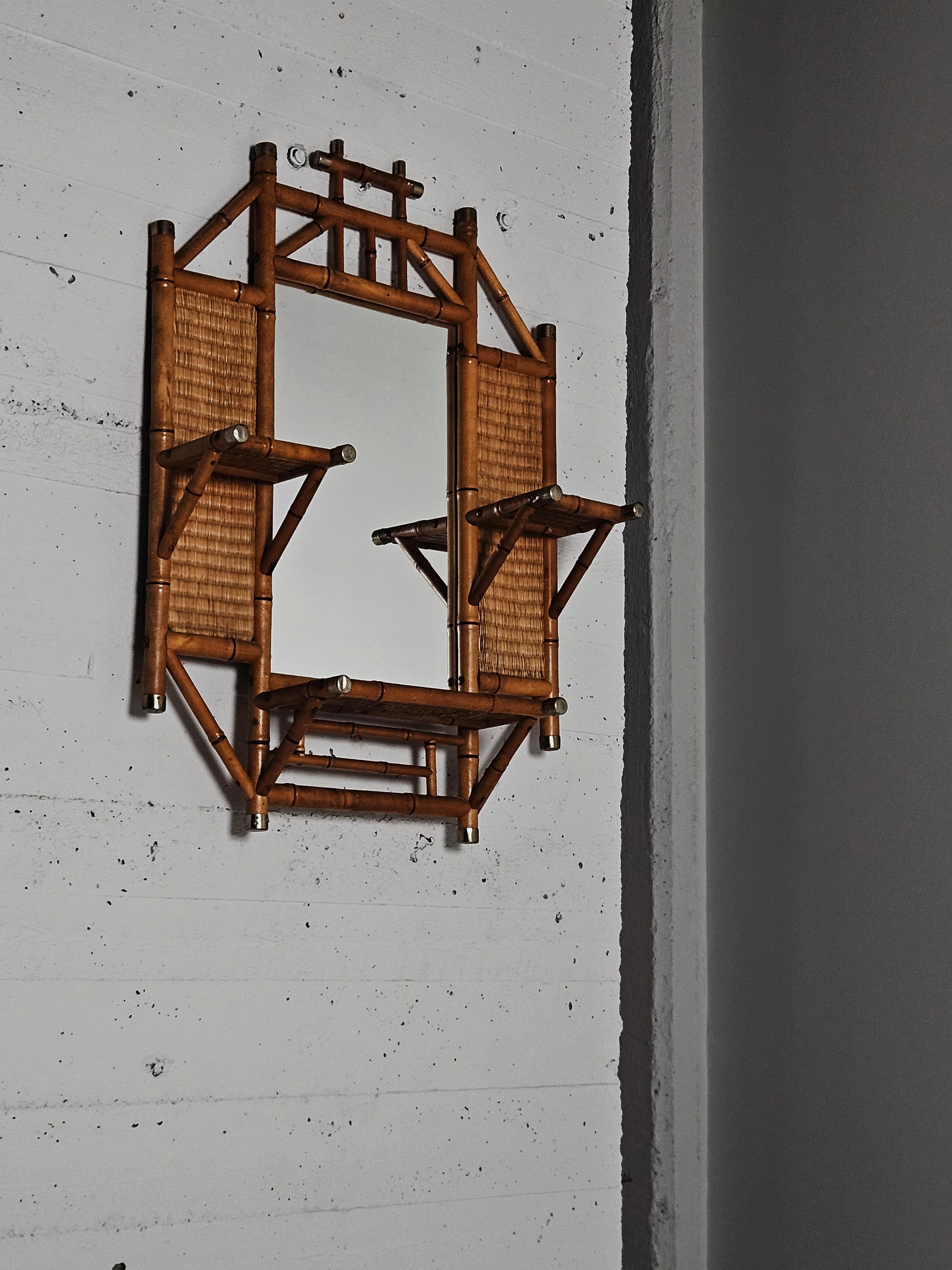 Wall mirror by unknown designer produced by Bodafors, Sweden, during the 1890s. 

Made in beech and rattan.

Signs of wear on rattan and on metal fittings.