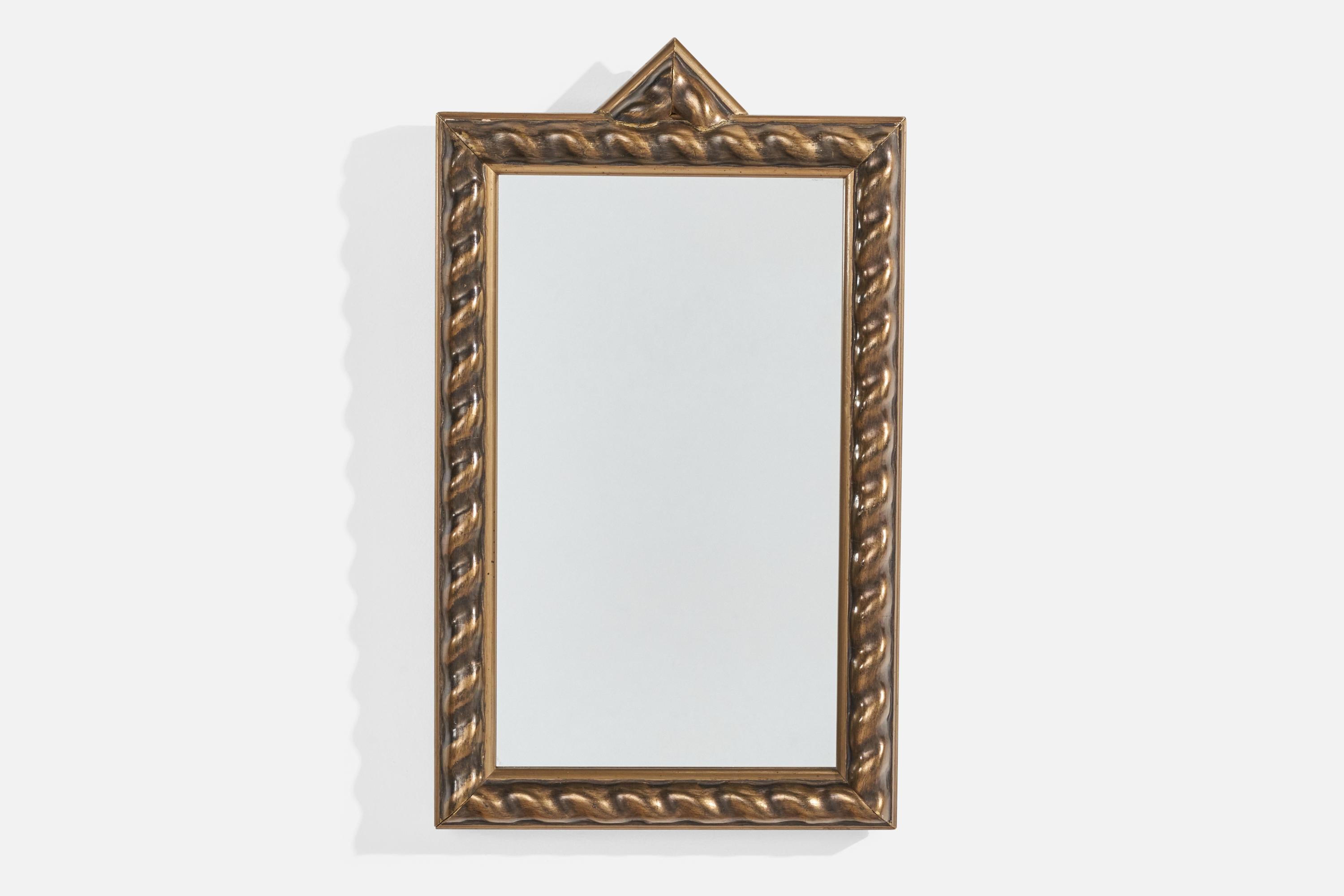 A gilt wood wall mirror designed and produced in Sweden, c. 1940s.

