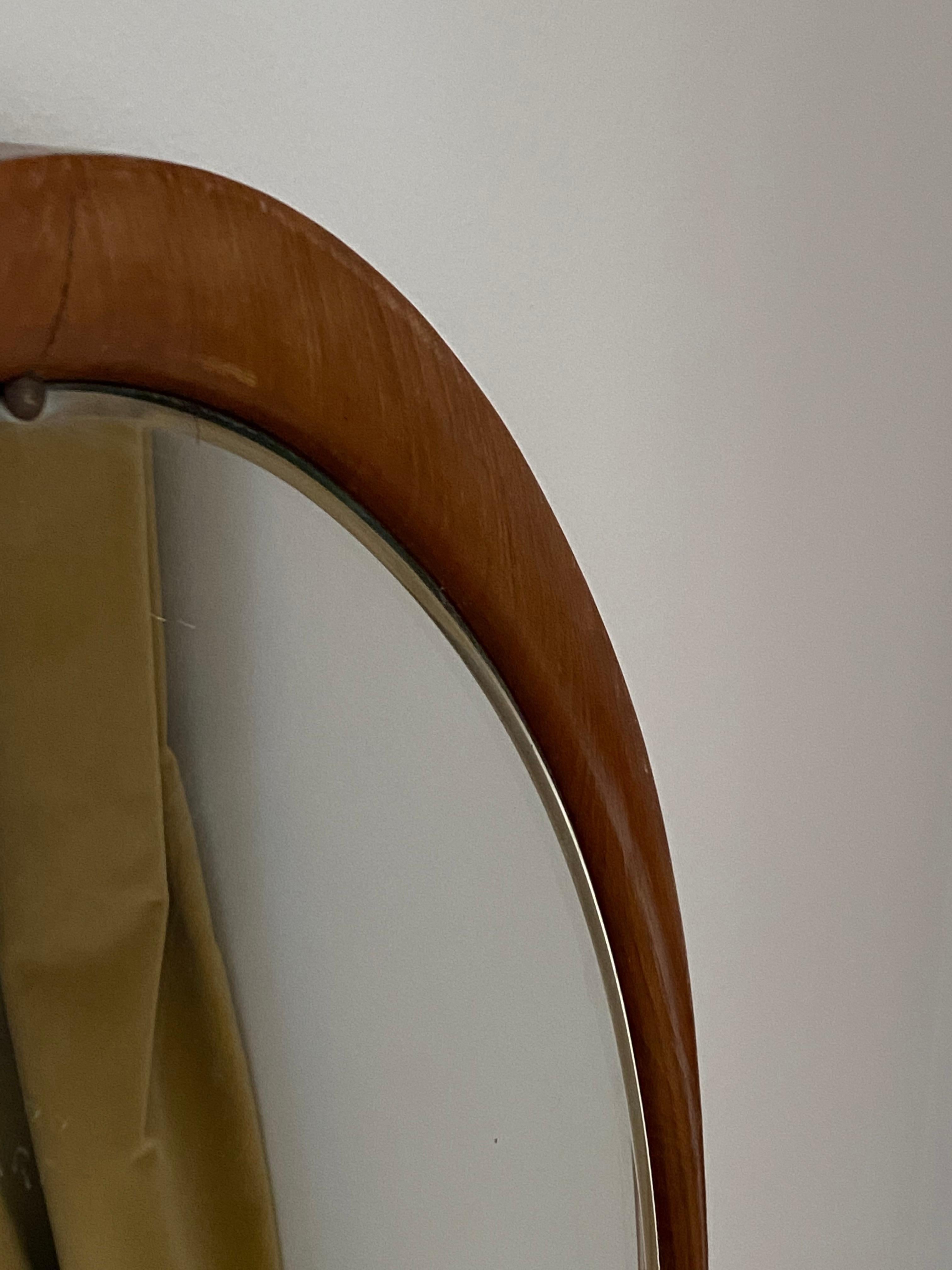 A wall mirror. Designed and produced in Sweden, 1950s. In teak, metal and mirror glass. Of very high production quality.

Other designers of the period include Fontana Arte, Max Ingrand, Josef Frank, Campo & Graffi, and Line Vautrin.