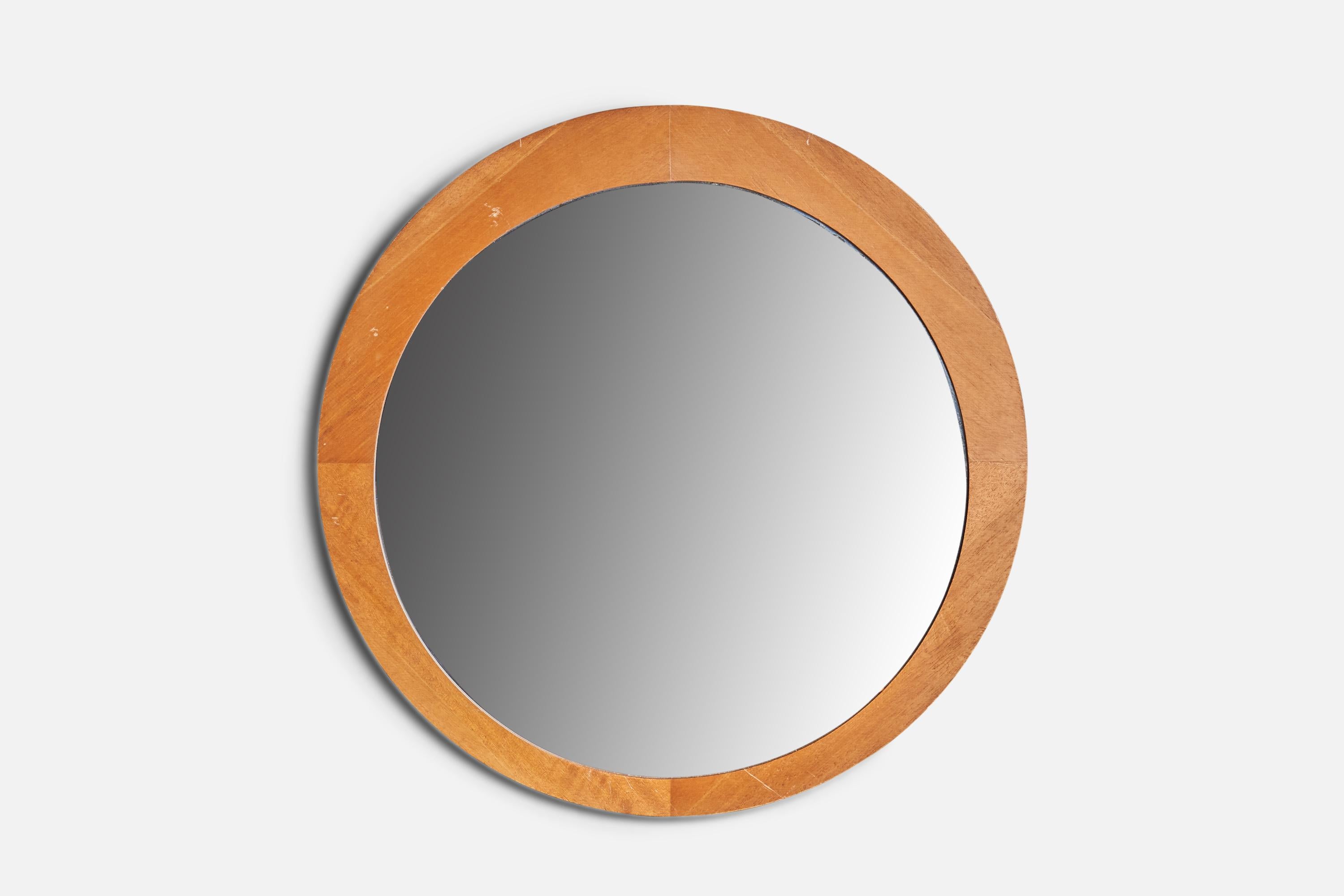 An oak wall mirror designed and produced in Sweden, 1960s.