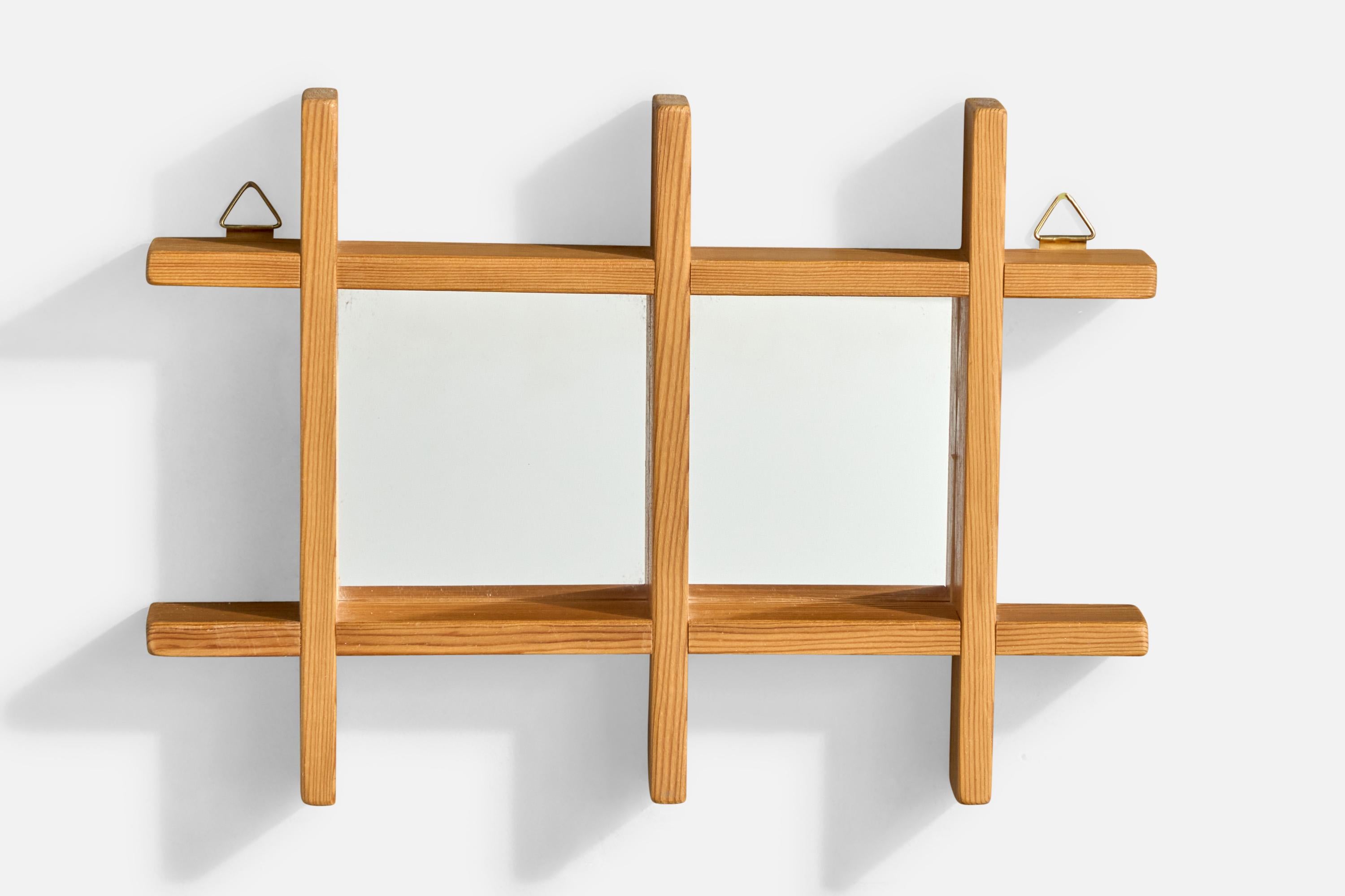 A pine wall mirror designed and produced in Sweden, c. 1970s.

Dimensions: 9.375” H x 13.25” W x 1.8” D
