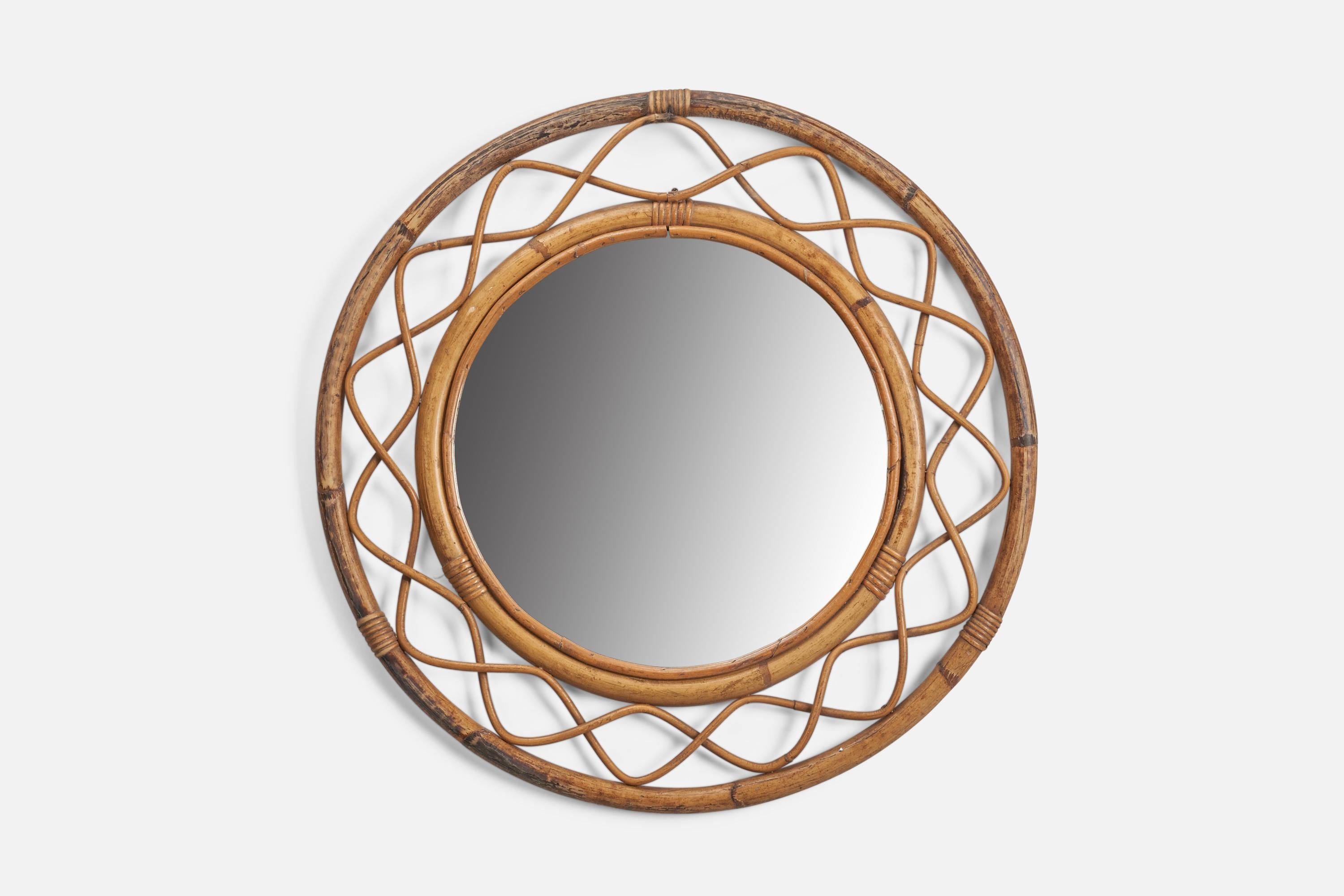 A rattan, bamboo, glass wall mirror designed and produced by a Swedish Designer, Sweden, 1960s.